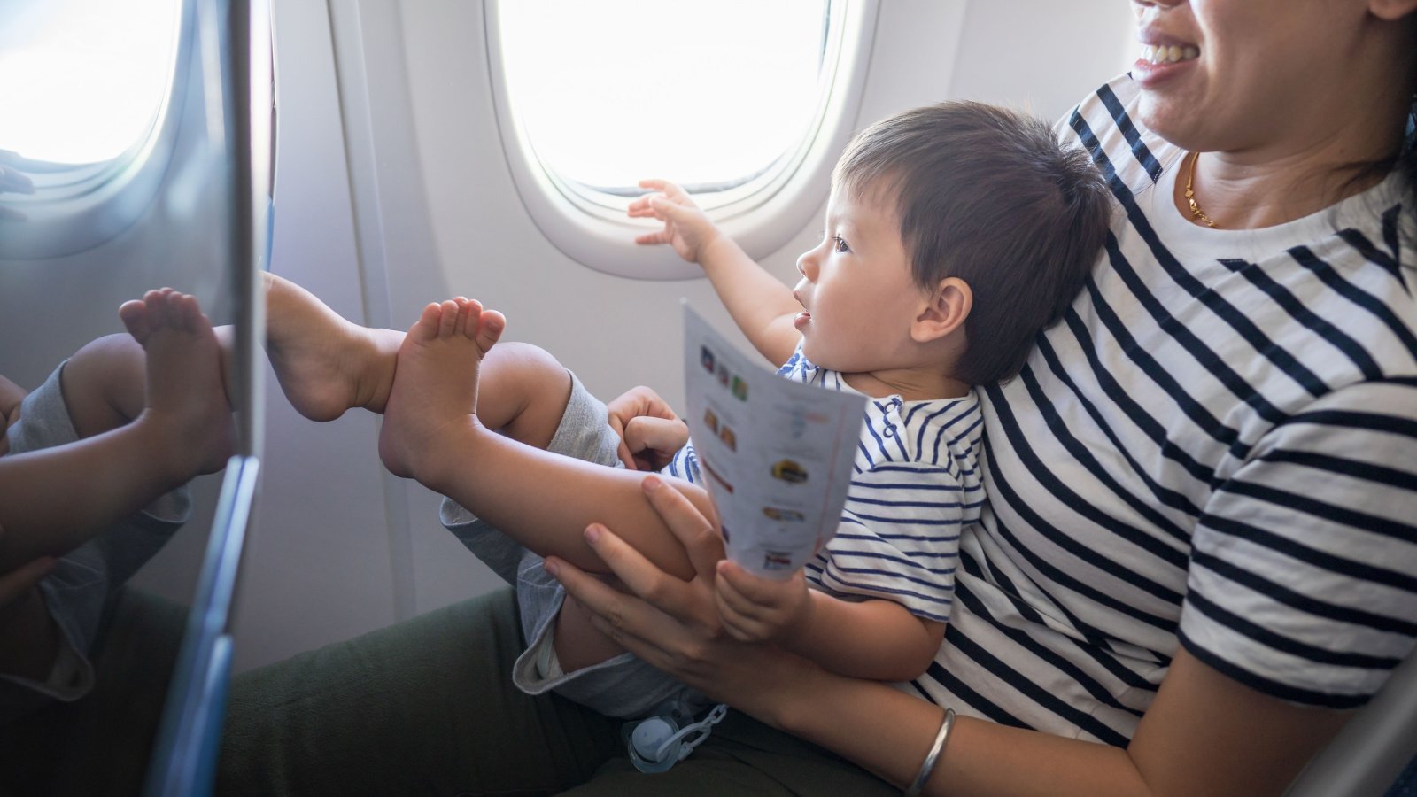 Travel Children kid infant airplane baby woman Creative Family shutterstock