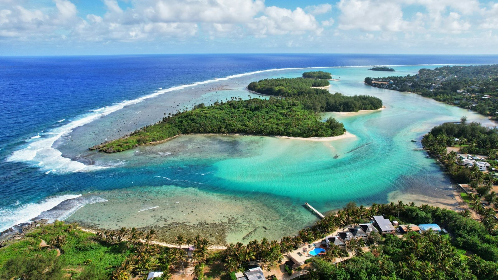 Tropical island coral lagoon sea beach Cook Islands Rarotonga Petr Podrouzek Shutterstock