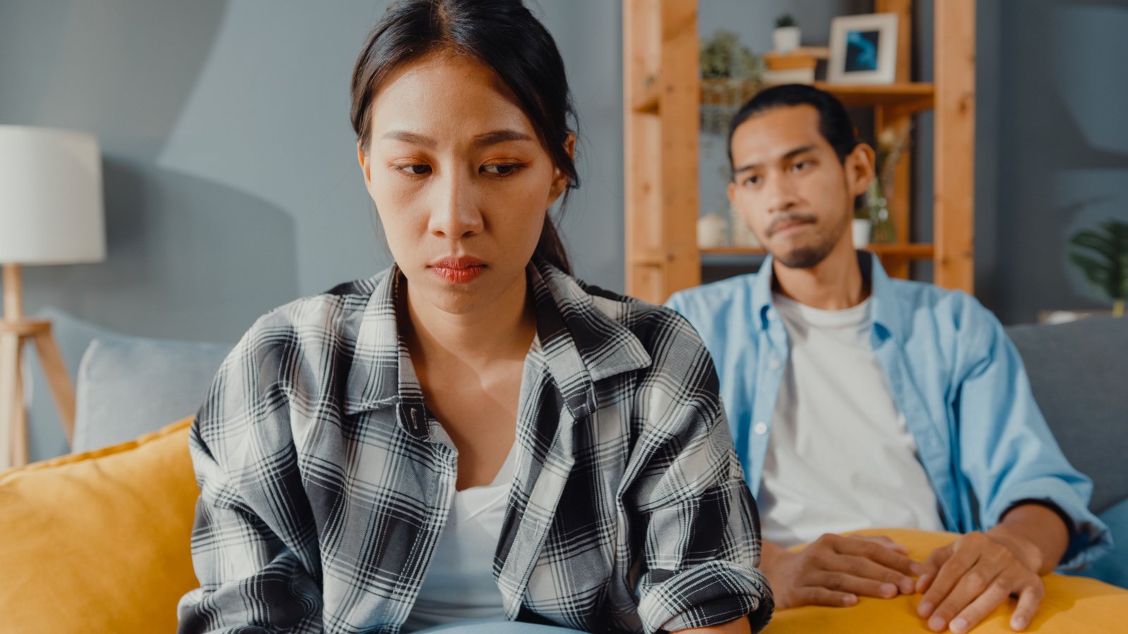 Unhappy Anxious couple fighting counceling break up Tirachard Kumtanom Shutterstock