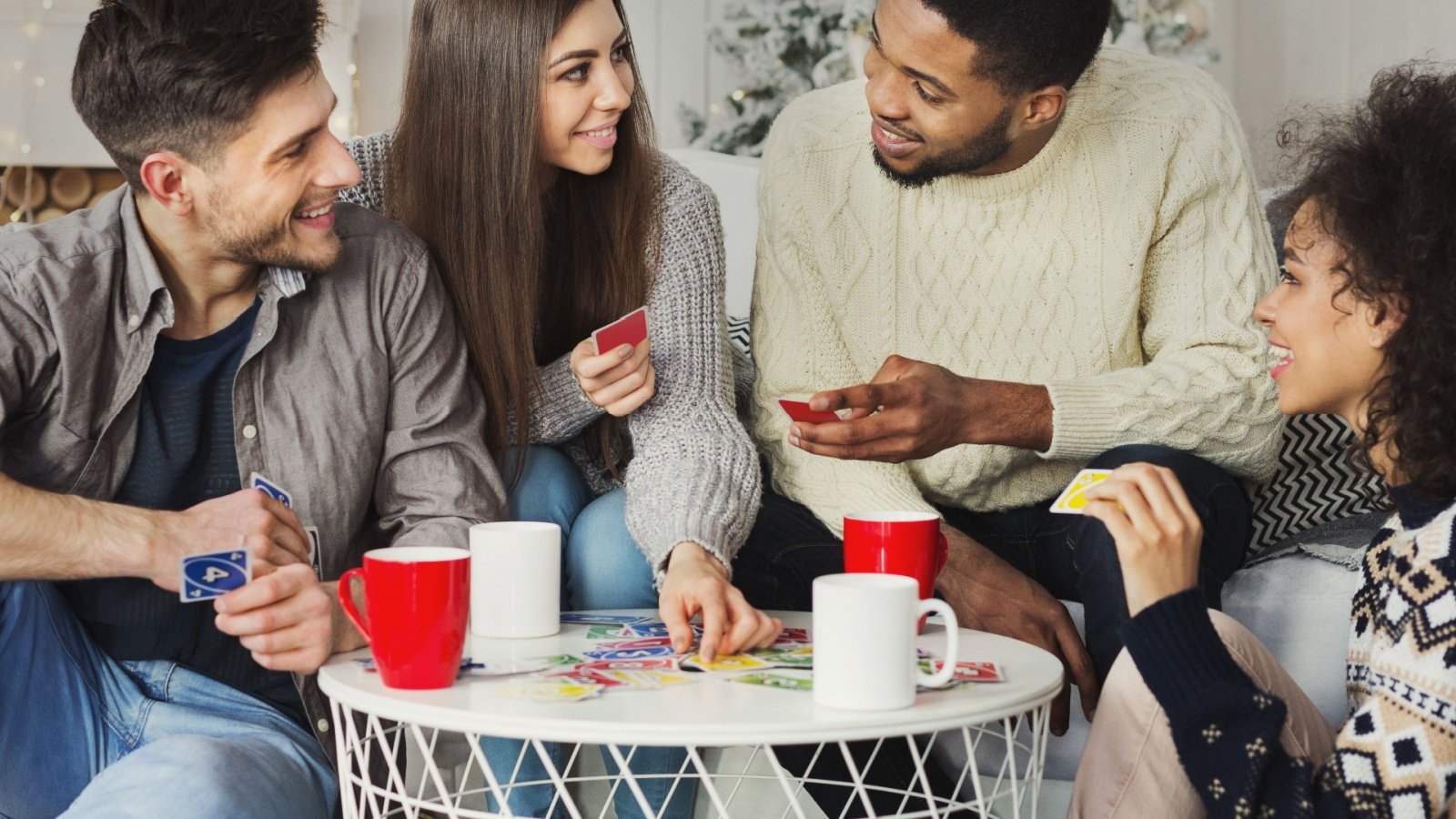 Uno Card Game with Friends Prostock studio Shutterstock