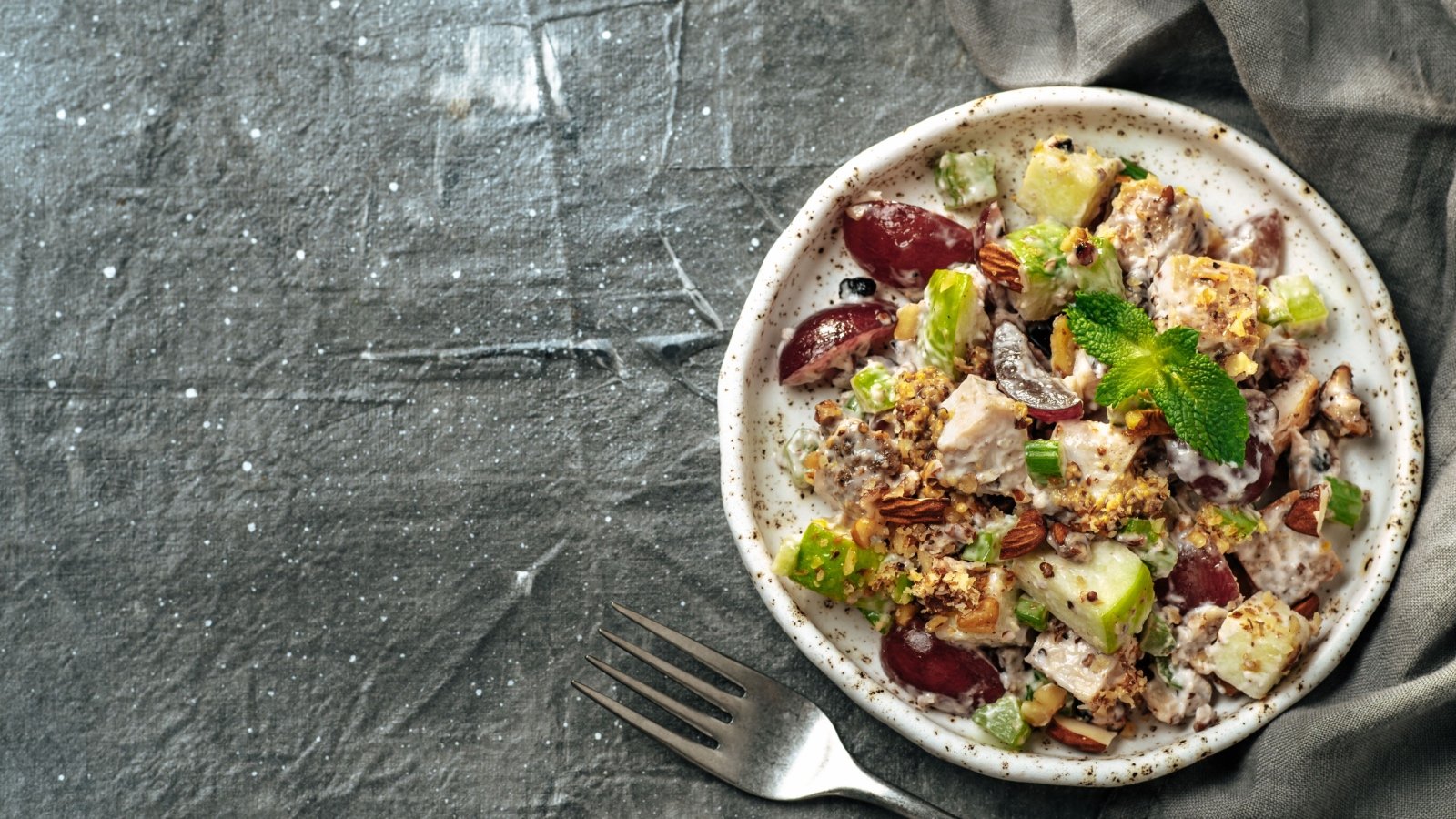 Waldorf salad with apples celery grapes chicken and mayonnaise Fascinadora Shutterstock Waldorf salad with apples celery grapes chicken and mayonnaise Fascinadora Shutterstock