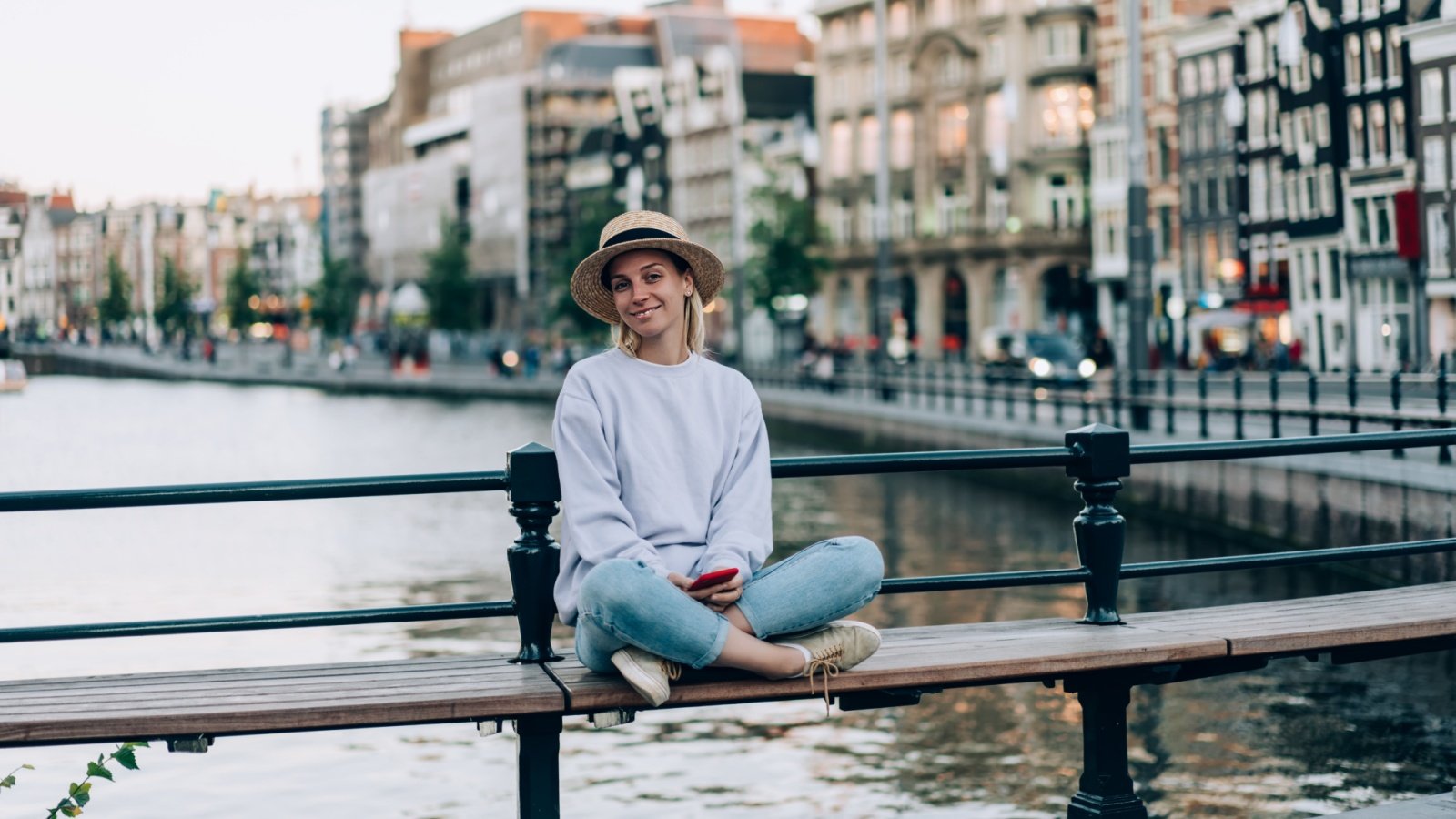 Woman Amsterdam Netherlands travel GaudiLab Shutterstock