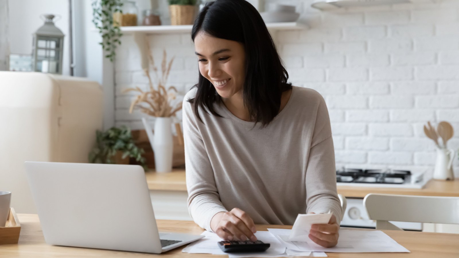 Woman Budget Money Finance Business Savings fizkes shutterstock