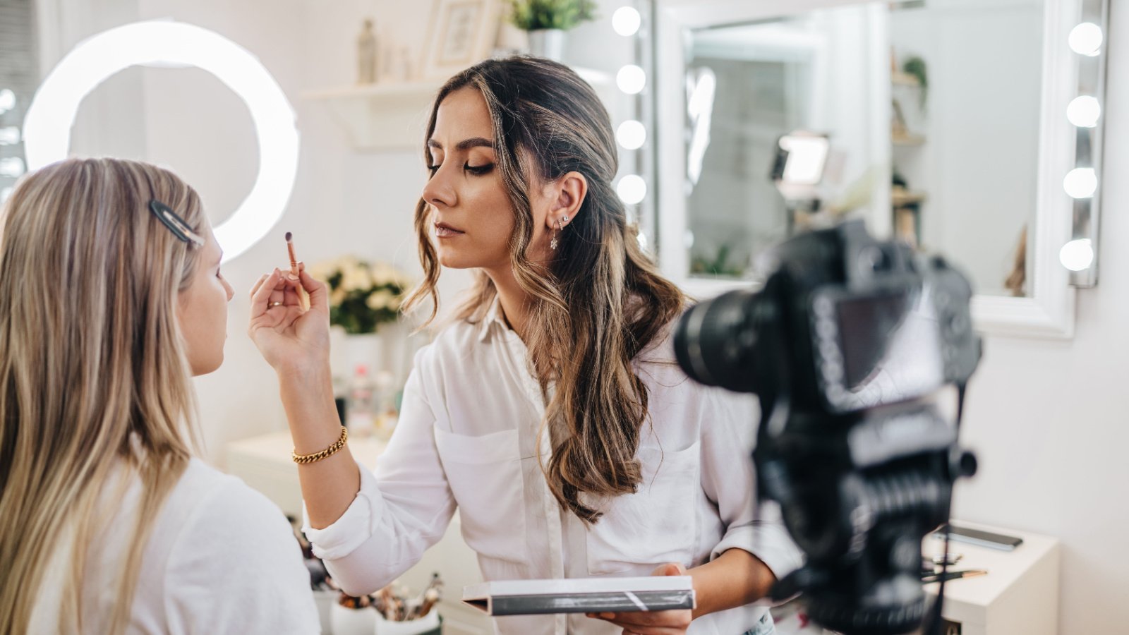 Woman Makeup artist professional job fashion DuxX Shutterstock