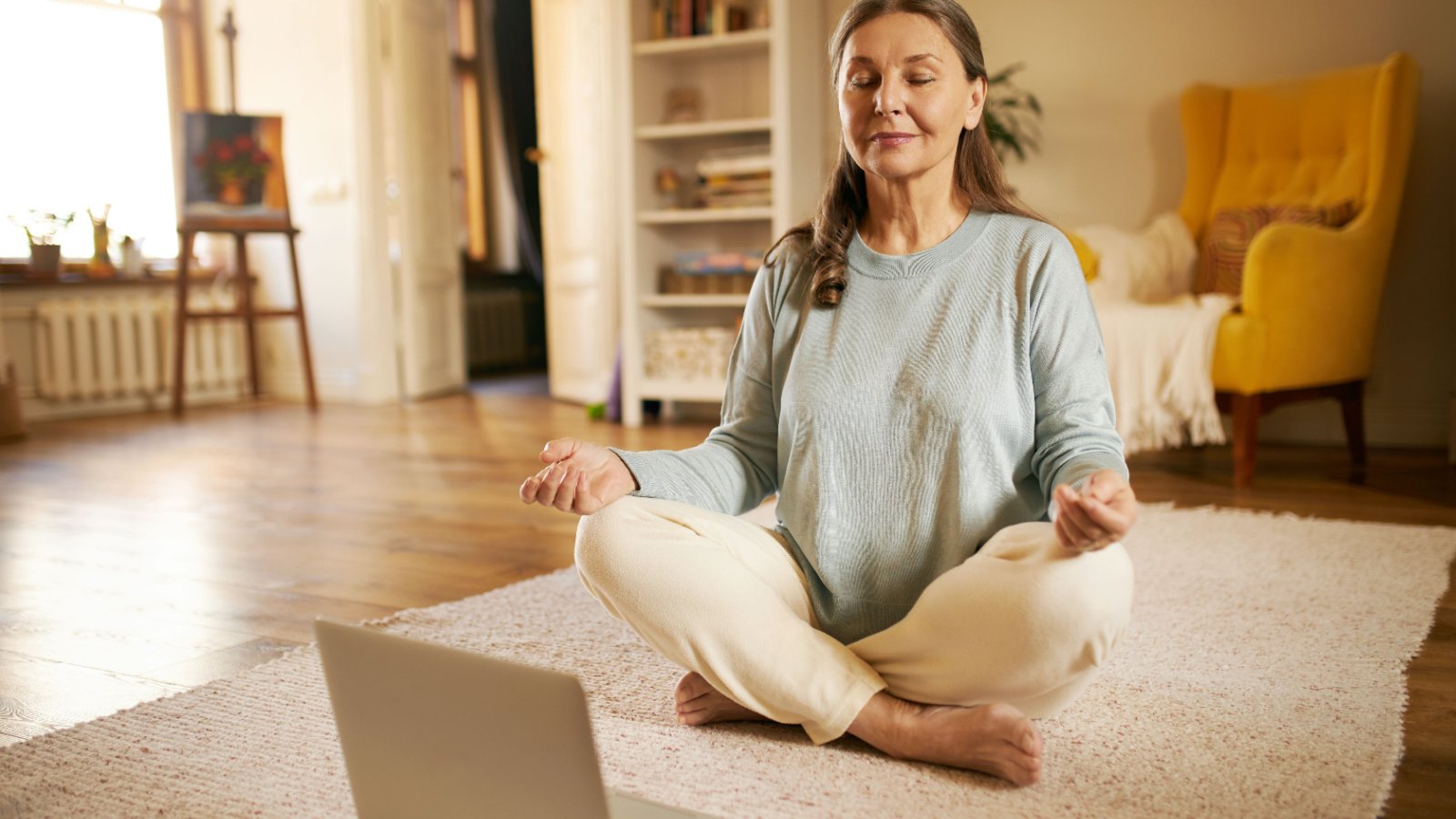 Woman Mature Meditation Relax Yoga Health Self Care shurkin son Shutterstock