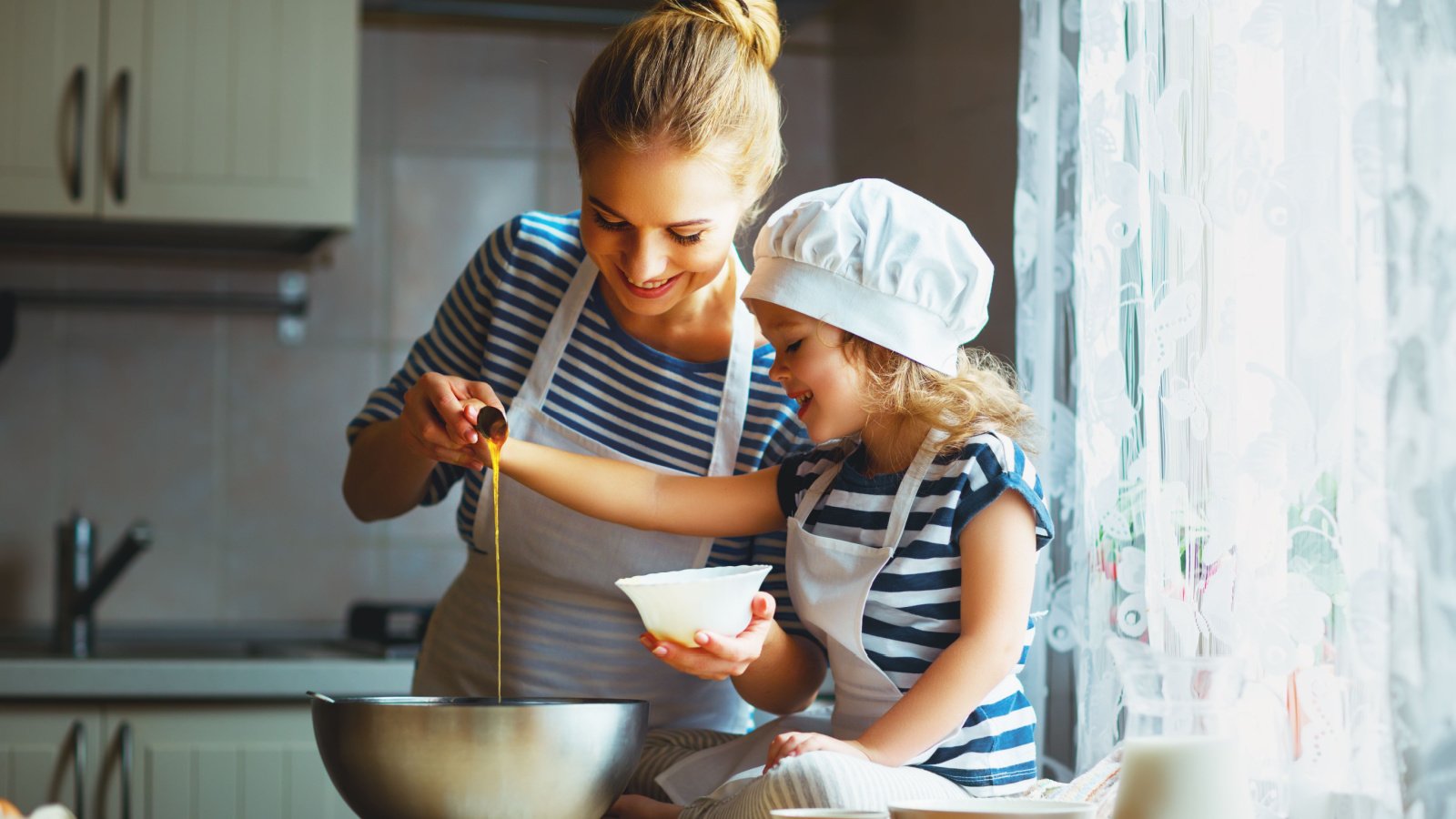 Woman Mother Child Parenting Cooking Baking Kitchen Family Evgeny Atamanenko Shutterstock