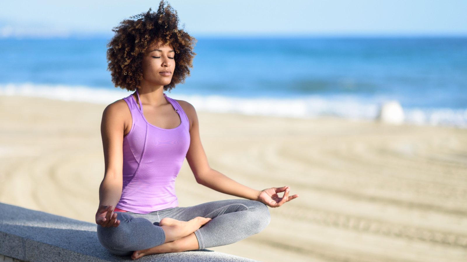 Woman POC Meditation Yoga Outside Health Relax Self Care Peace javi indy Shutterstock