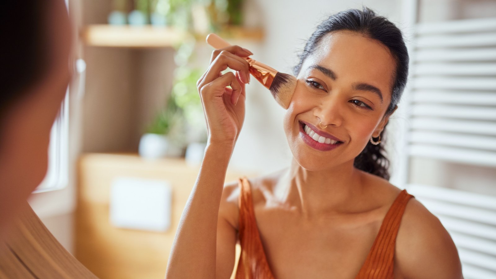 Woman POC makeup getting ready Rido Shutterstock