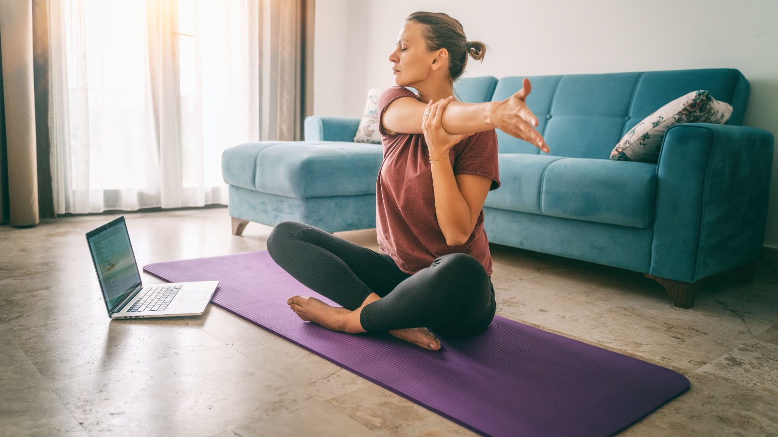 Woman Yoga Stretching Home Relax Self Care Health Olezzo Shutterstock