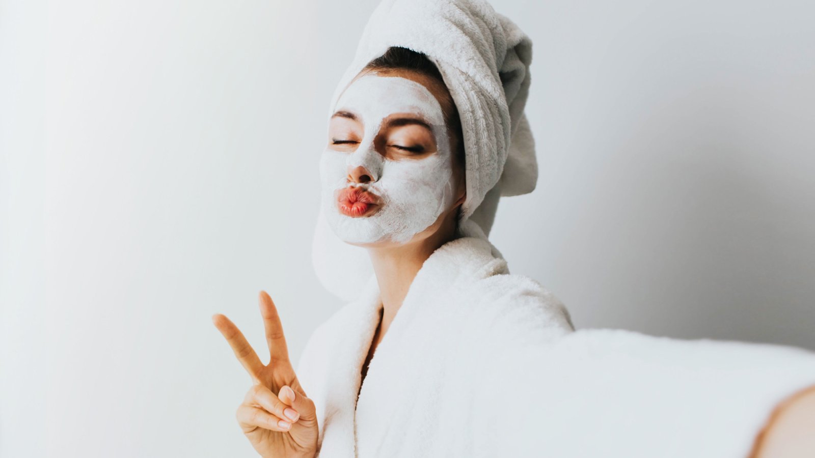 Woman Young Relax Self Care Face Mask Make up Bath Robe Claudia K Shutterstock