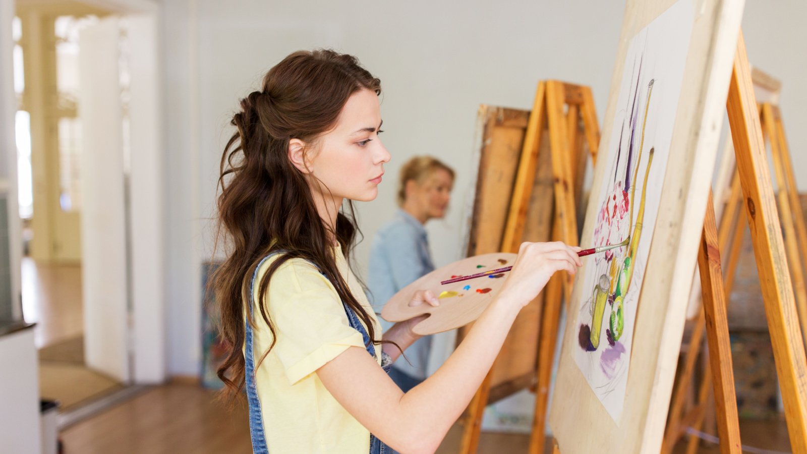 Woman creating art painting relax wellness hobby artist class Ground Picture Shutterstock