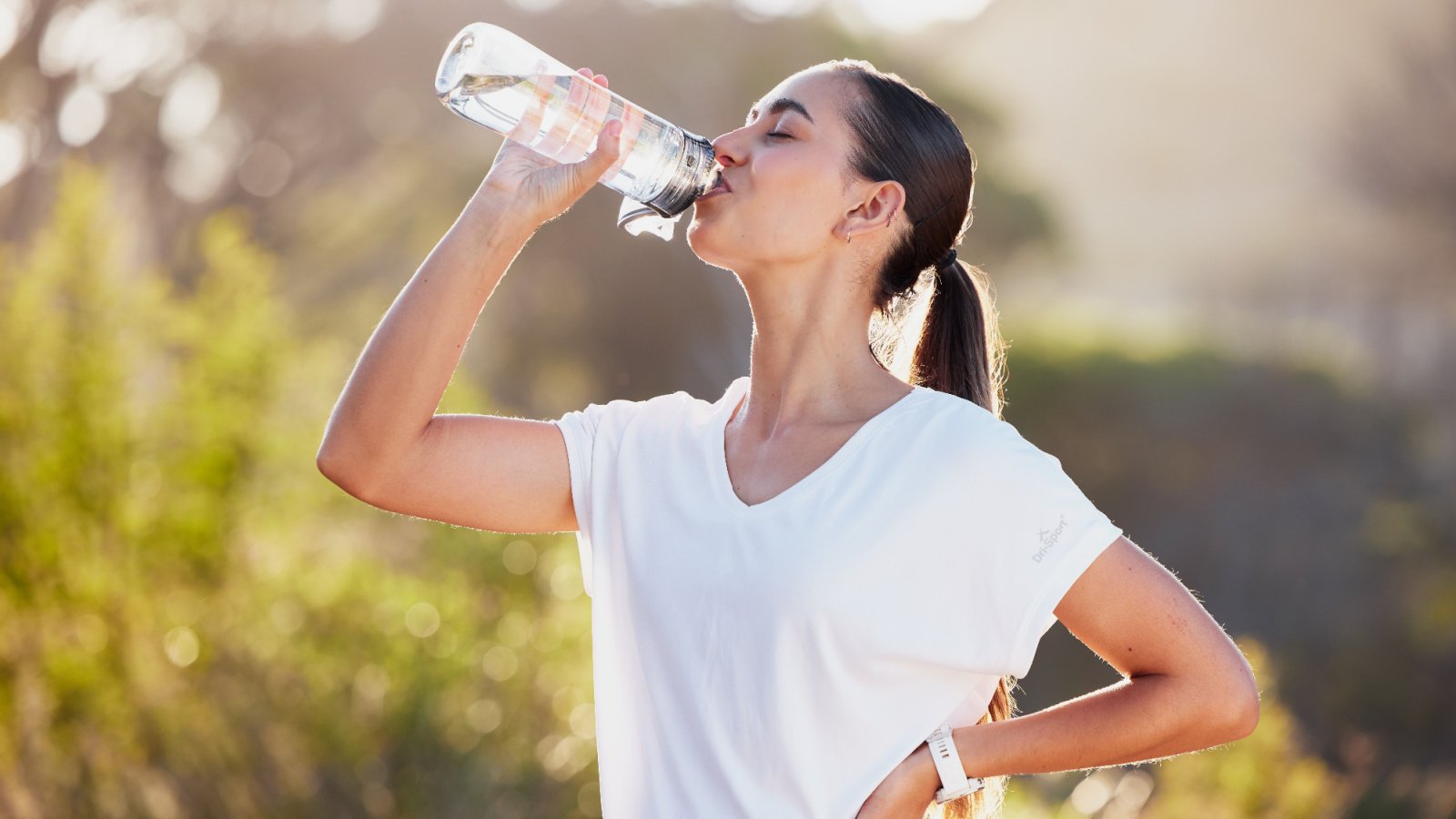 Woman drinking water hydration exercise health PeopleImages.com Yuri A Shutterstock