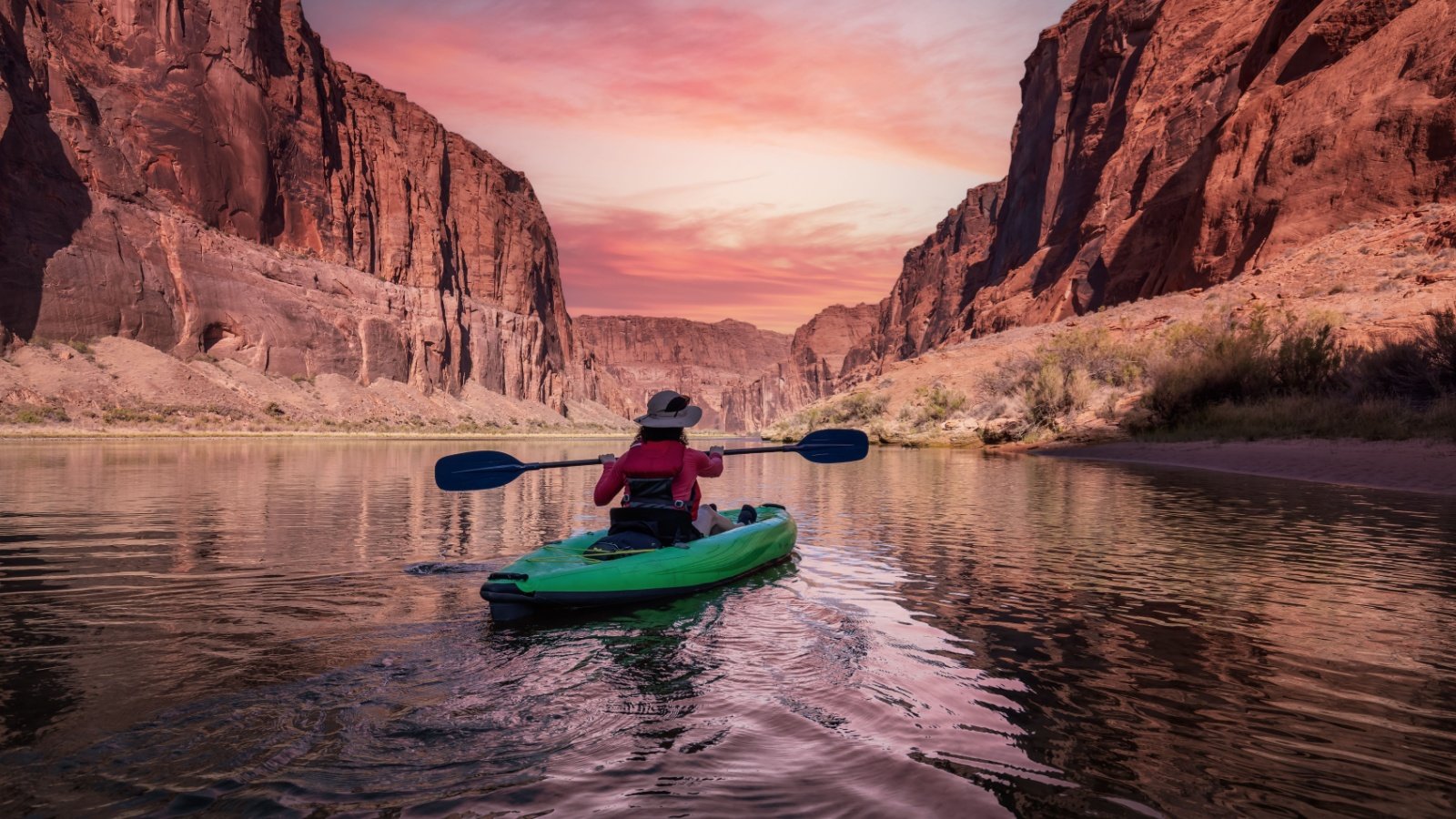 Woman on a Kayak paddling in Colorado River Glen Canyon Arizona outdoor exercise water sports lake EB Adventure Photography Shutterstock