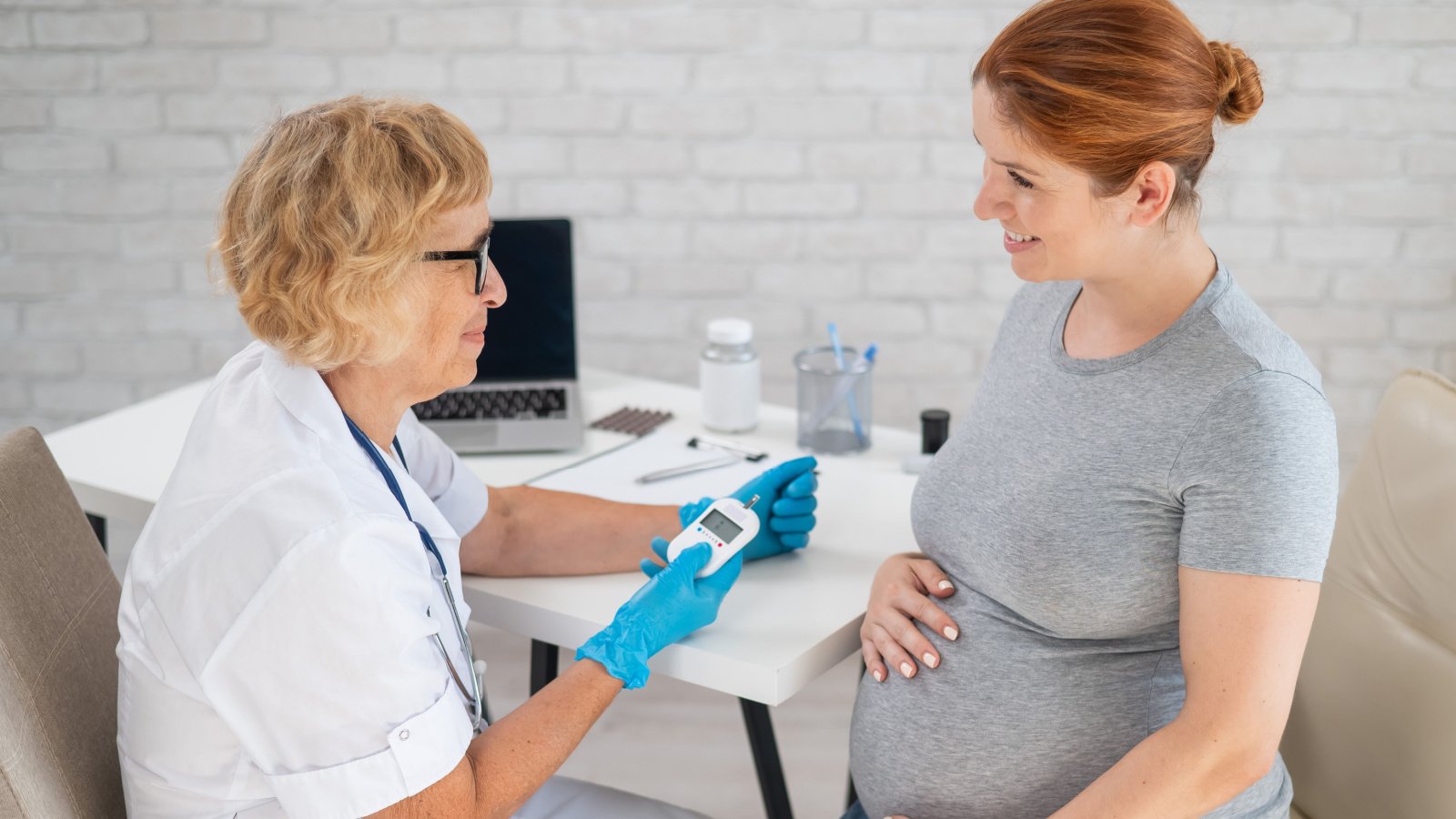 Woman pregnant doctor health diabetes nurse Reshetnikov art Shutterstock