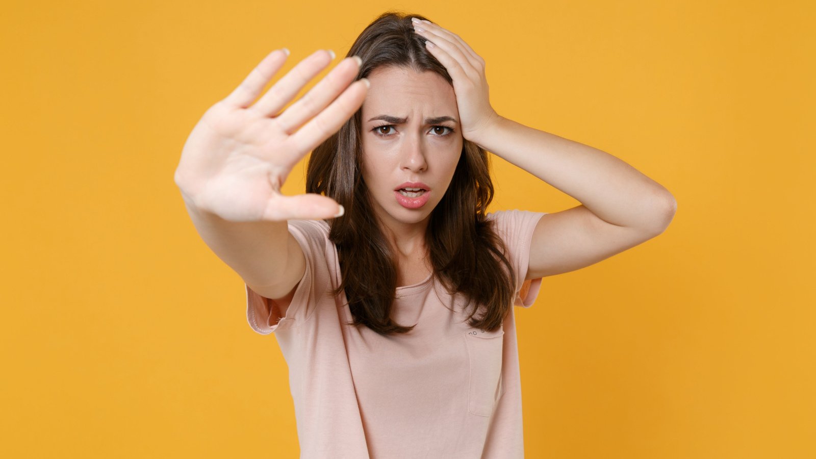 Worried young brunette woman stop no back vidl studio shutterstock