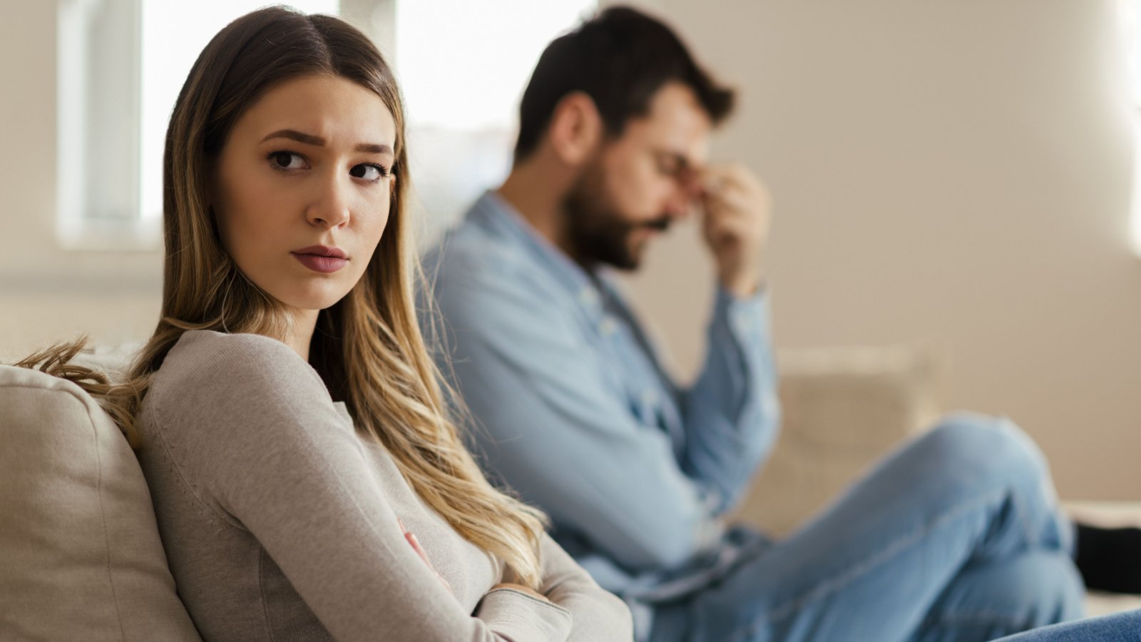 Worried young woman stressed upset couple fight goksi shutterstock