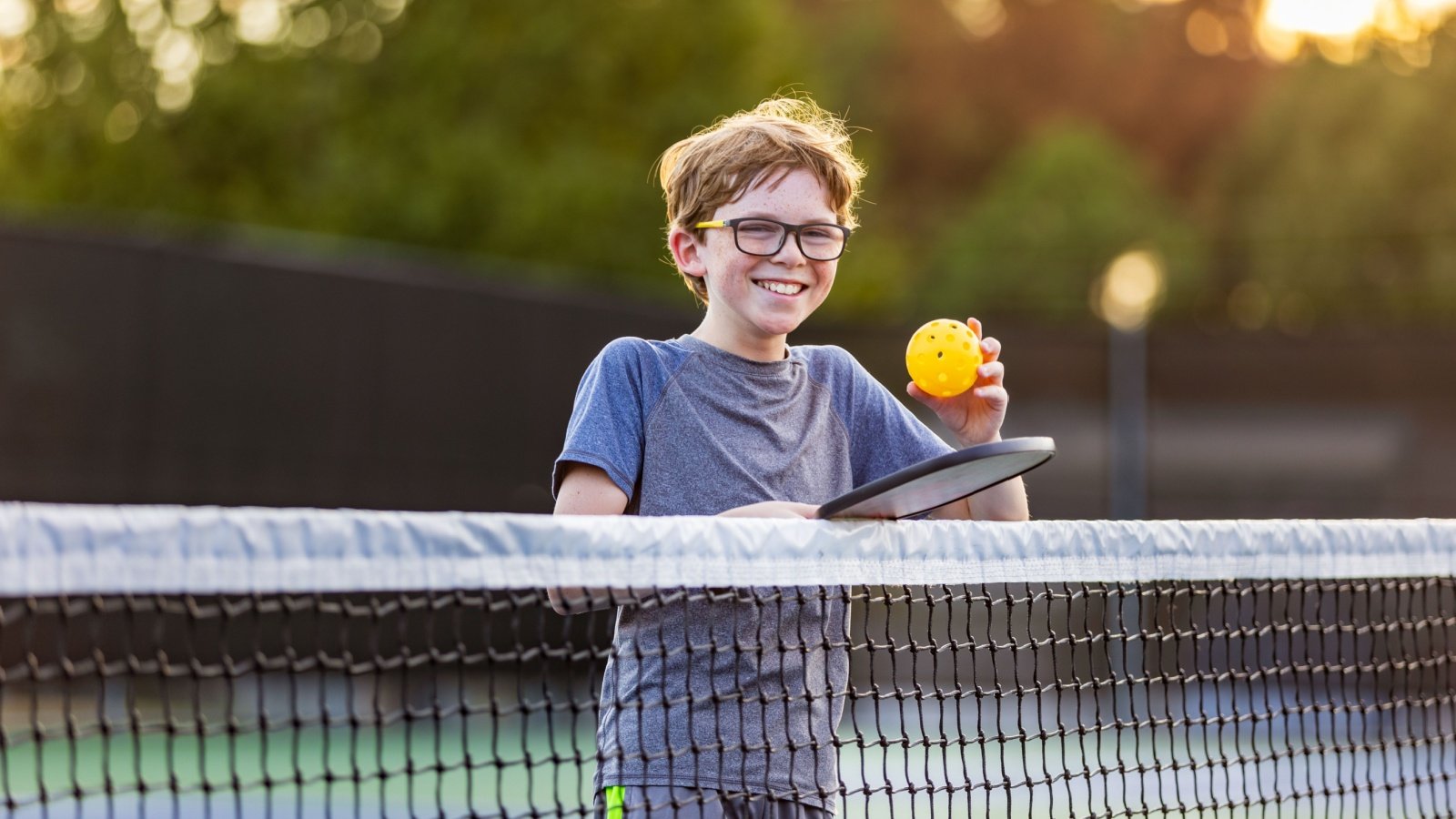 Young Boy Sports Fitness Pickleball Court Chad Robertson Media Shutterstock