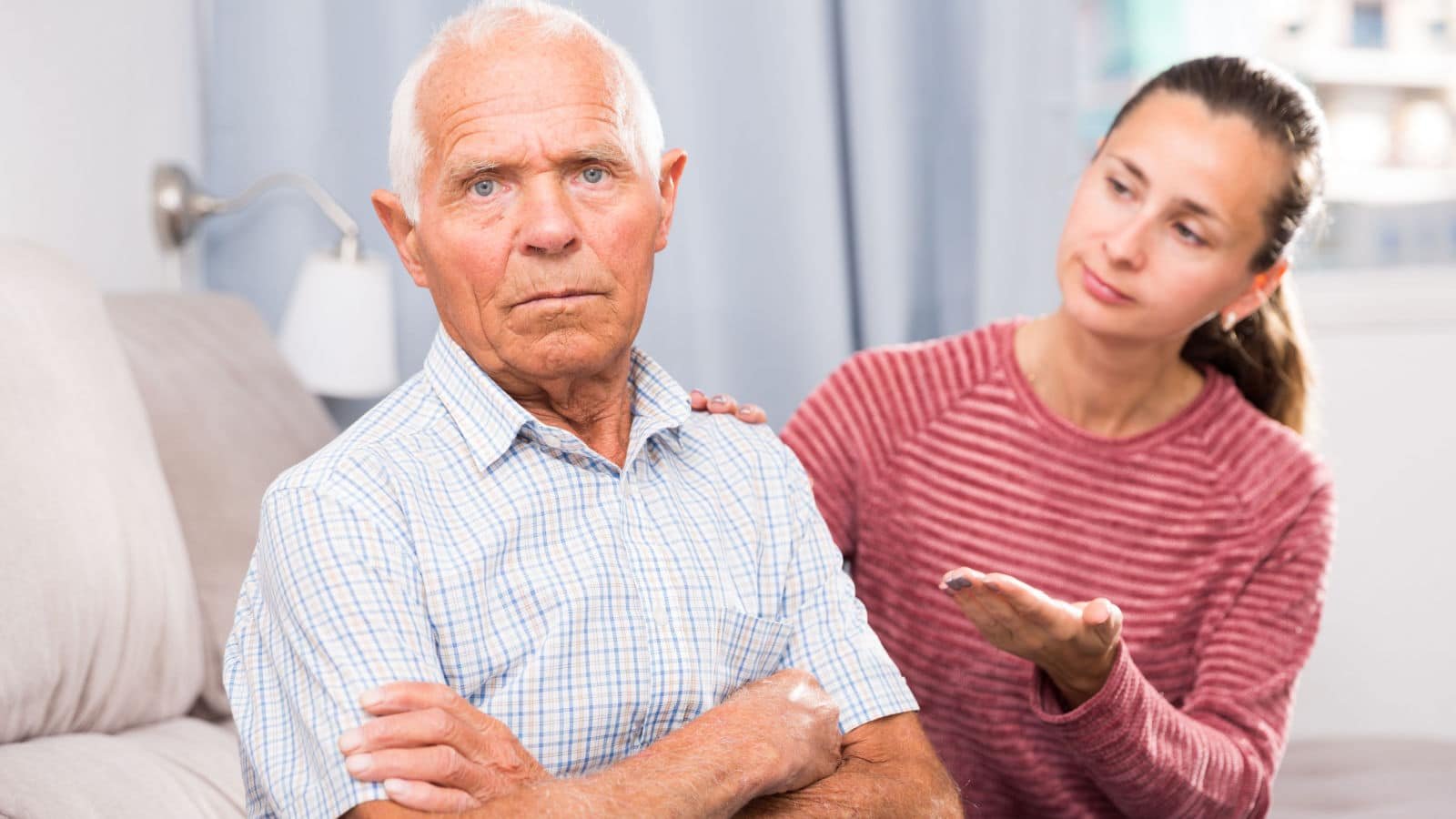 adult daughter and elderly father fighting upset conversation