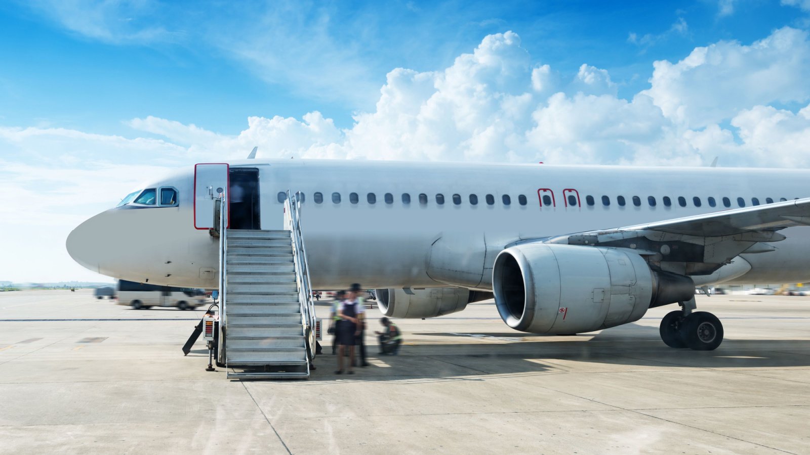 airplane airport loading boarding gui jun peng shutterstock