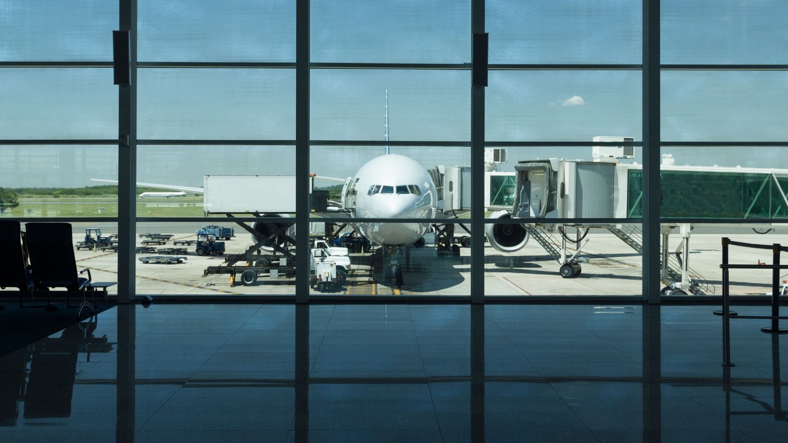 airport flight flying airplane airline terminal inside tostphoto Shutterstock