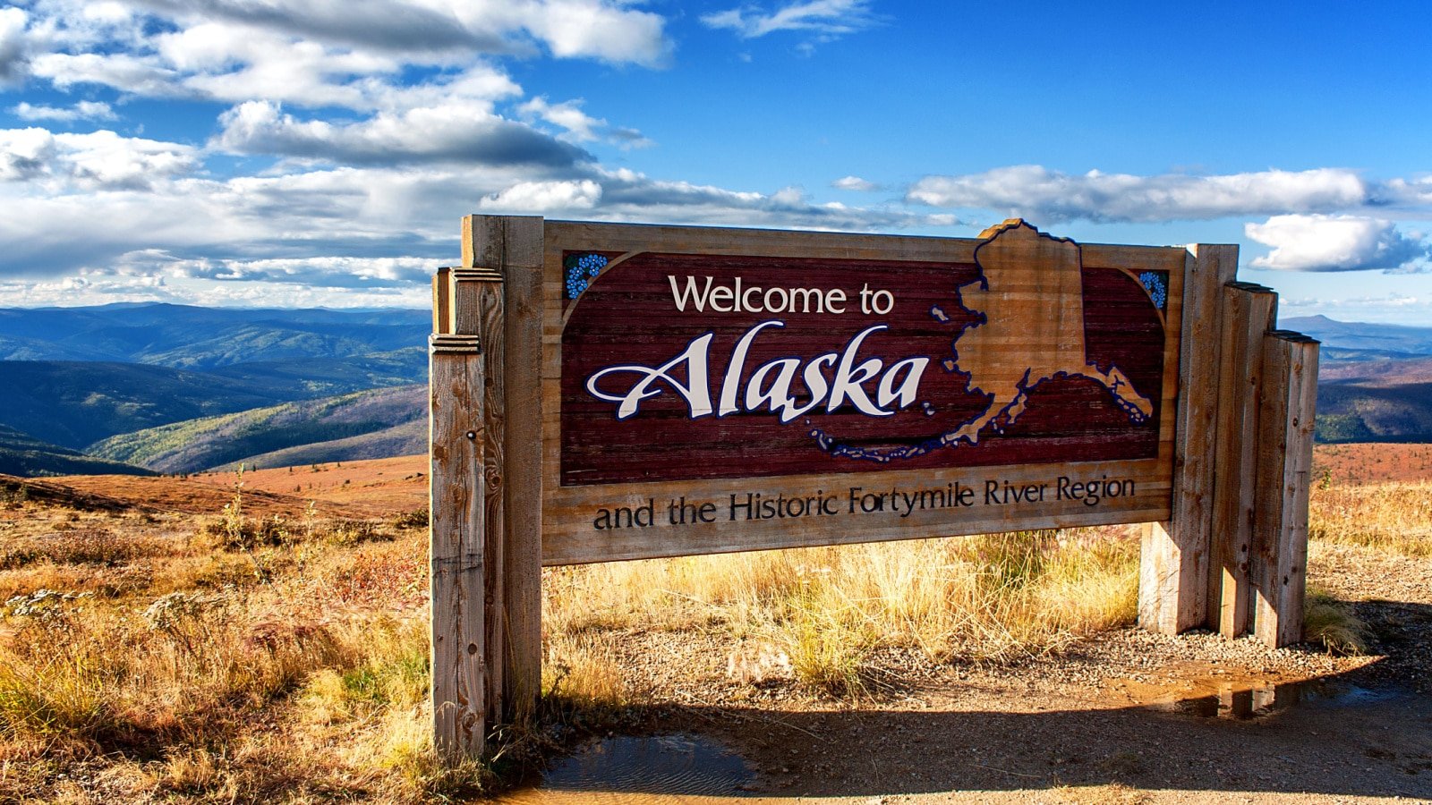 alaska travel landscape sign