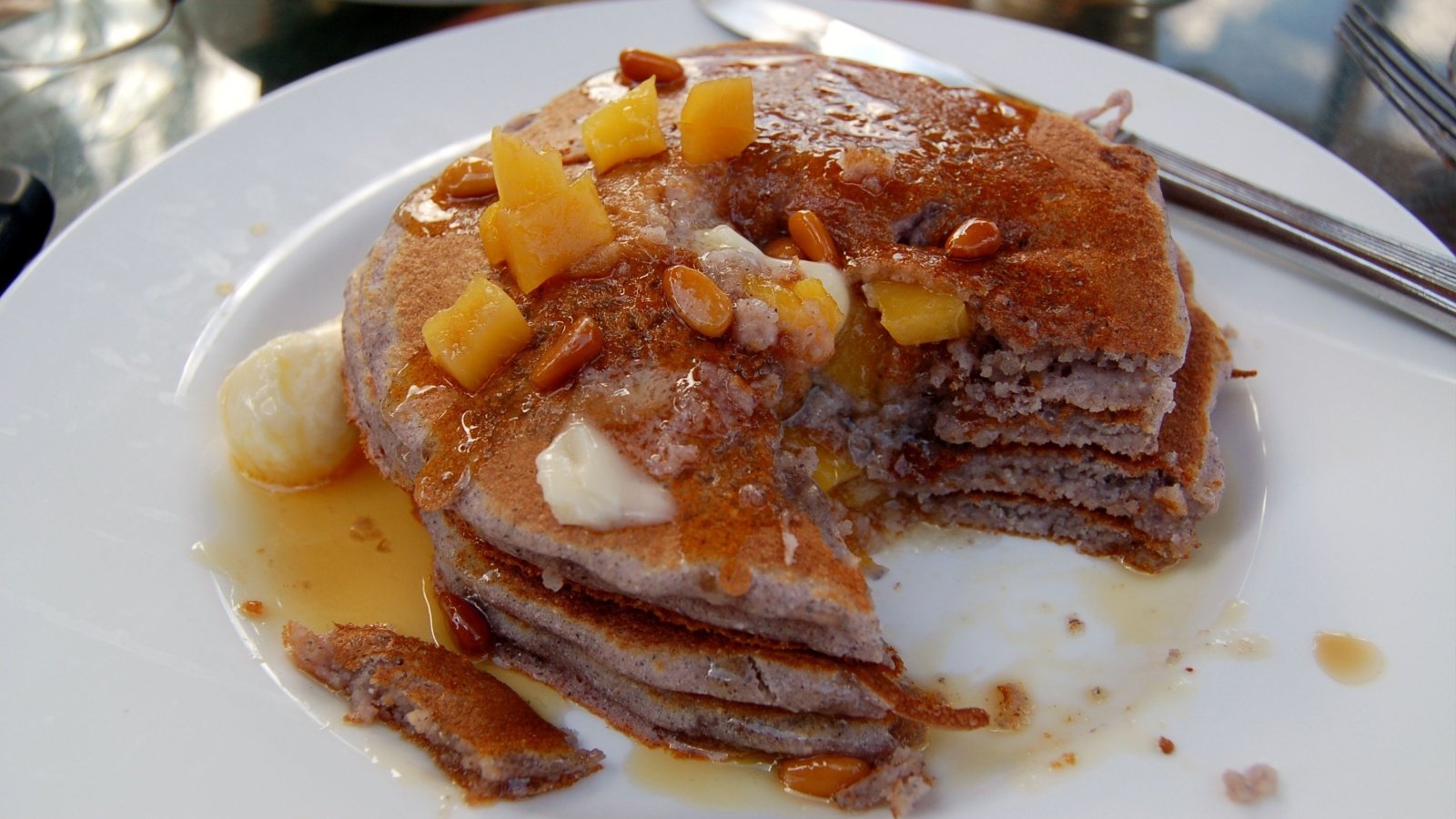 blue corn pancakes with fruit maple syrup and pine nuts Grandtraveler Shutterstock