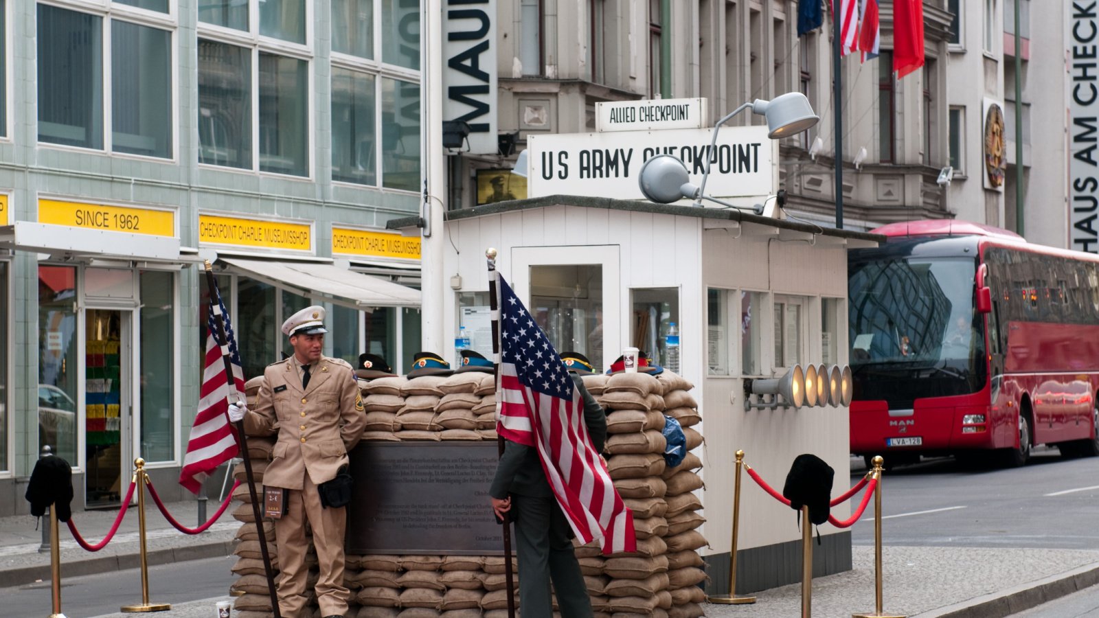 checkpoint Point Charlie in Berlin Germany Cold War lexan shutterstock