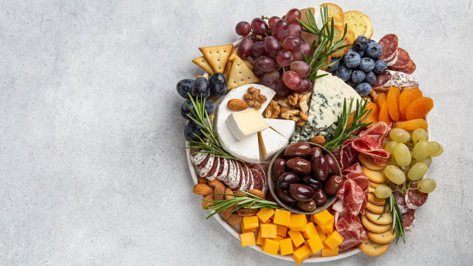 cheese board charcuterie olive food cooking Anna Shepulova Shutterstock