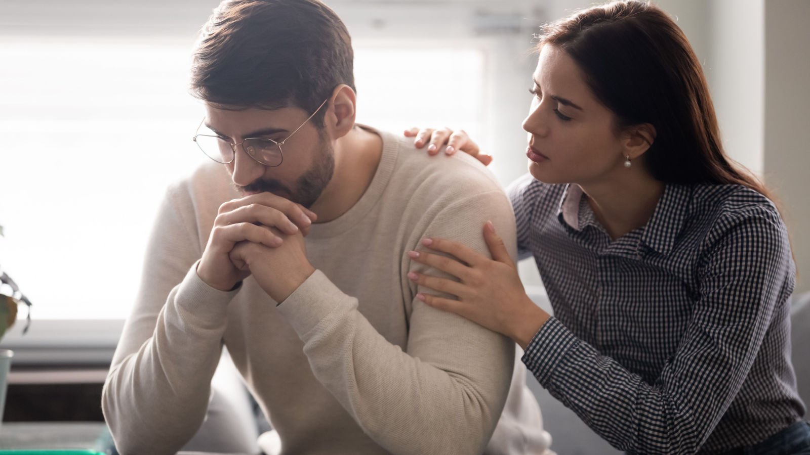 couple fight grief sad fizkes shutterstock