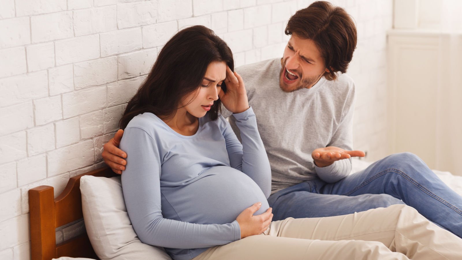 couple fight pregnant feeling unwell after husband screaming at her yelling prostock studio shutterstock