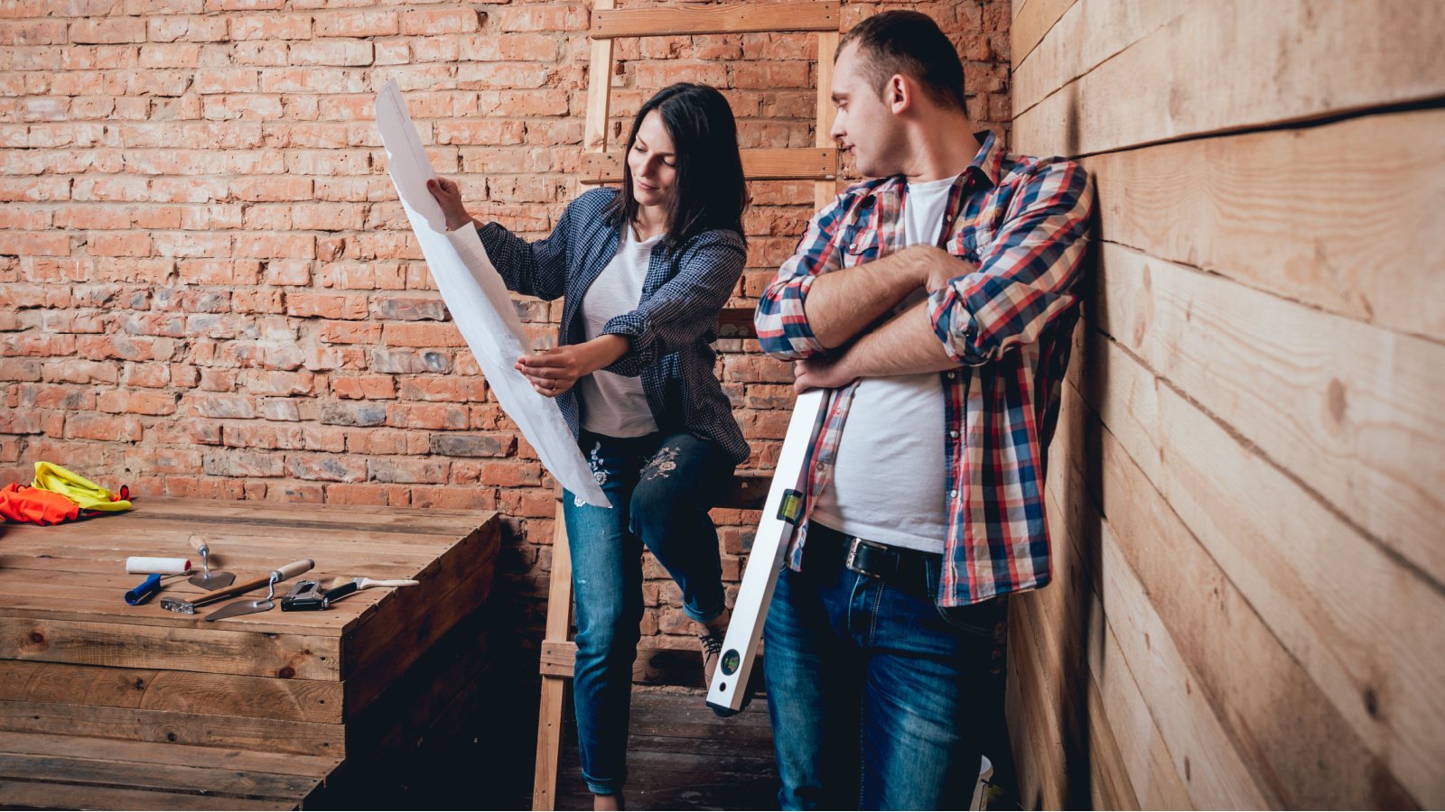 couple making home repairs improvement design wood brick roman zaiets shutterstock