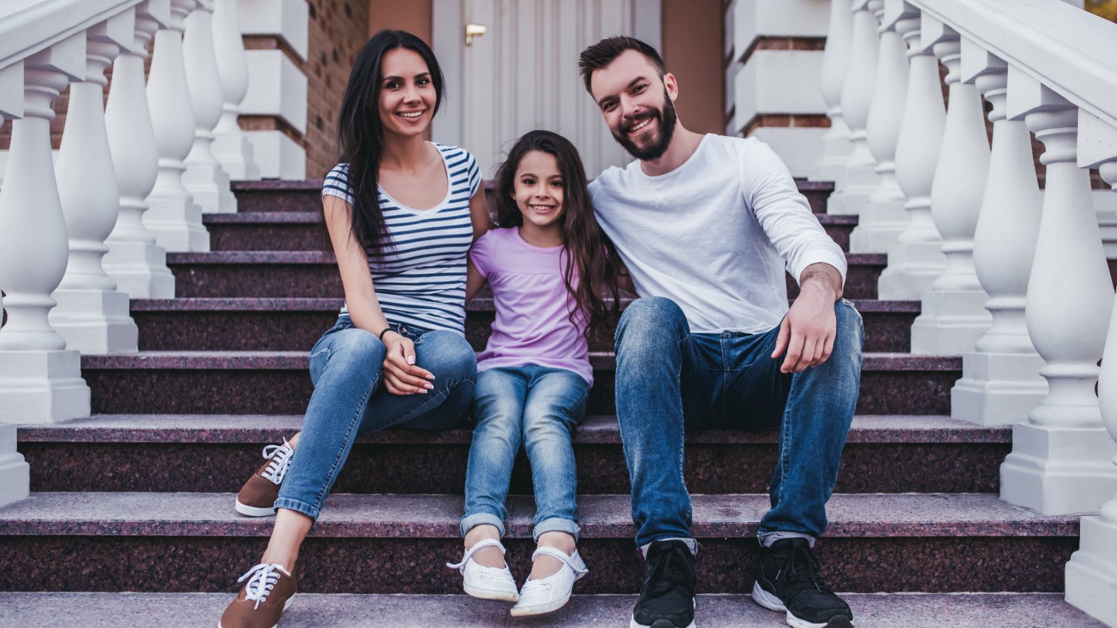 family is sitting on porch of their modern private house home moving in neighborhood 4 pm production shutterstock