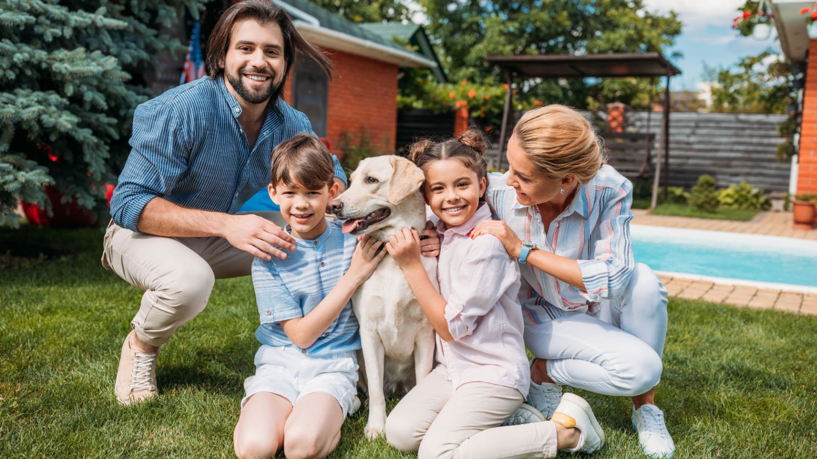 family outside backyard pool neighbor fence lightfield studios shutterstock