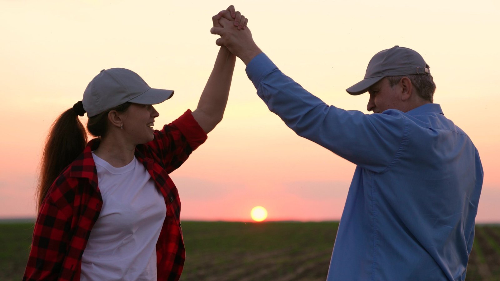 farmers making deal money holding hands agriculture super fox shutterstock