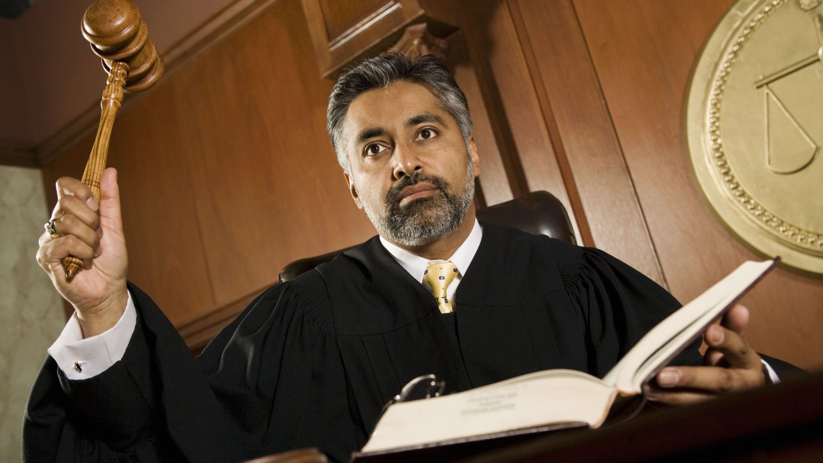 judge pounding mallet in courtroom legal lawyer sirtravelalot shutterstock