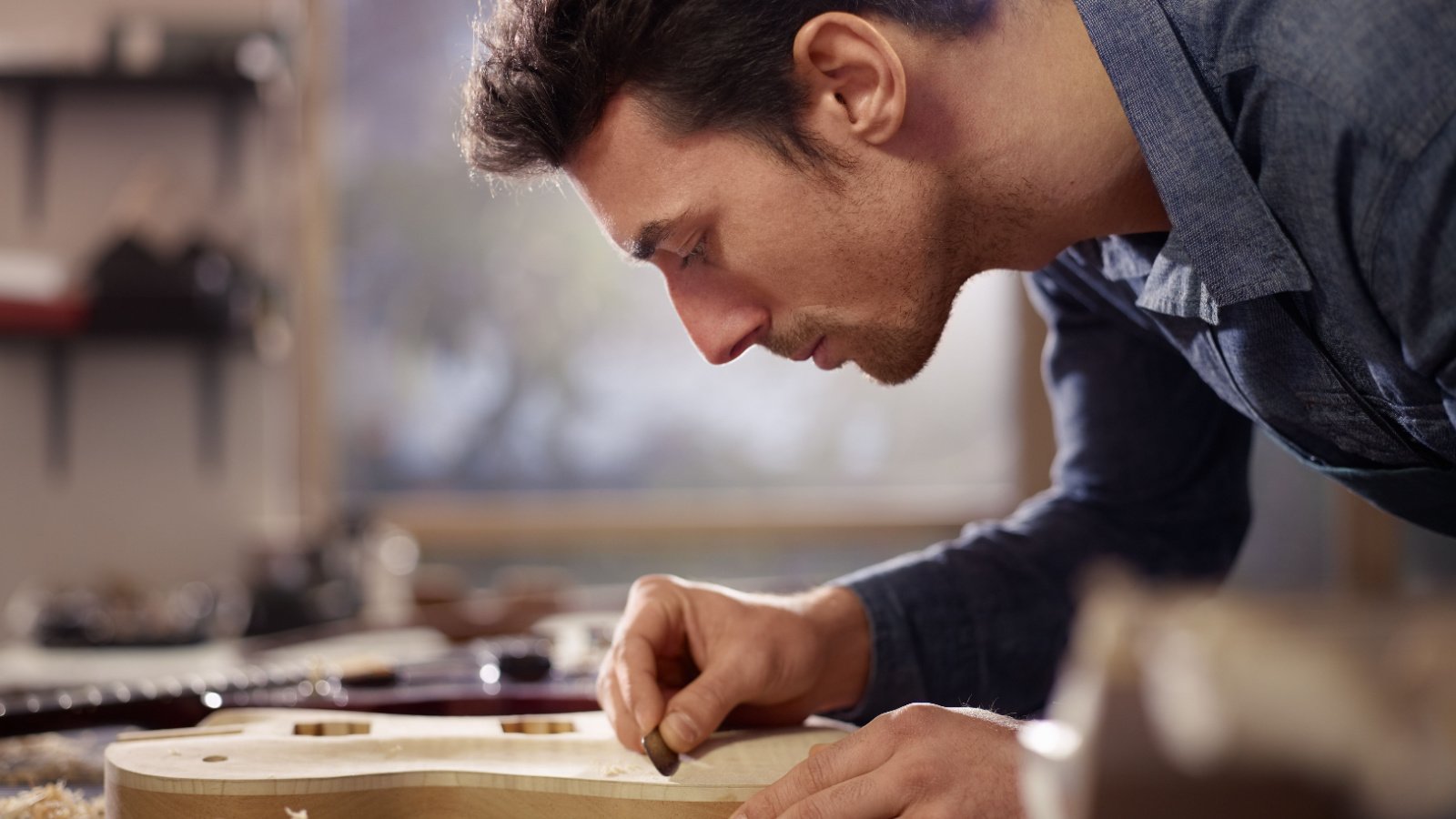 male craftsman workshop woodwork tools Diego Cervo shutterstock