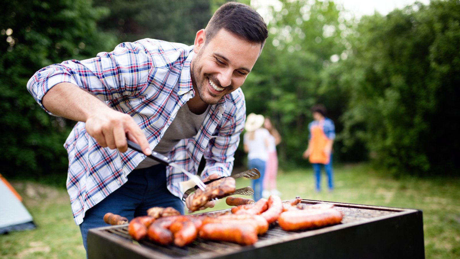 male grilling meat carnivore bbq cook out july 4th summer NDAB Creativity Shutterstock