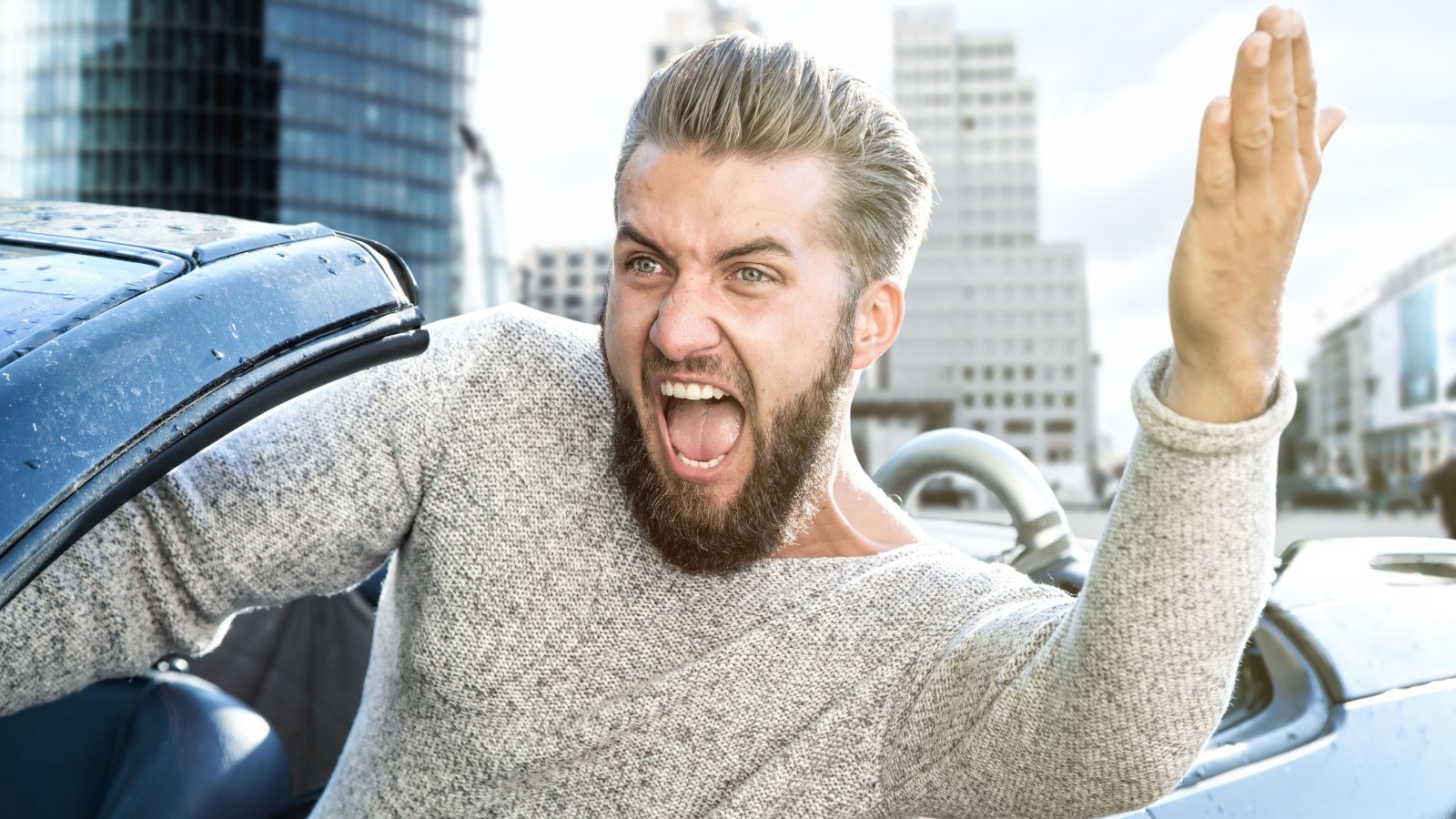 male in convertible car driving Cara Foto shutterstock