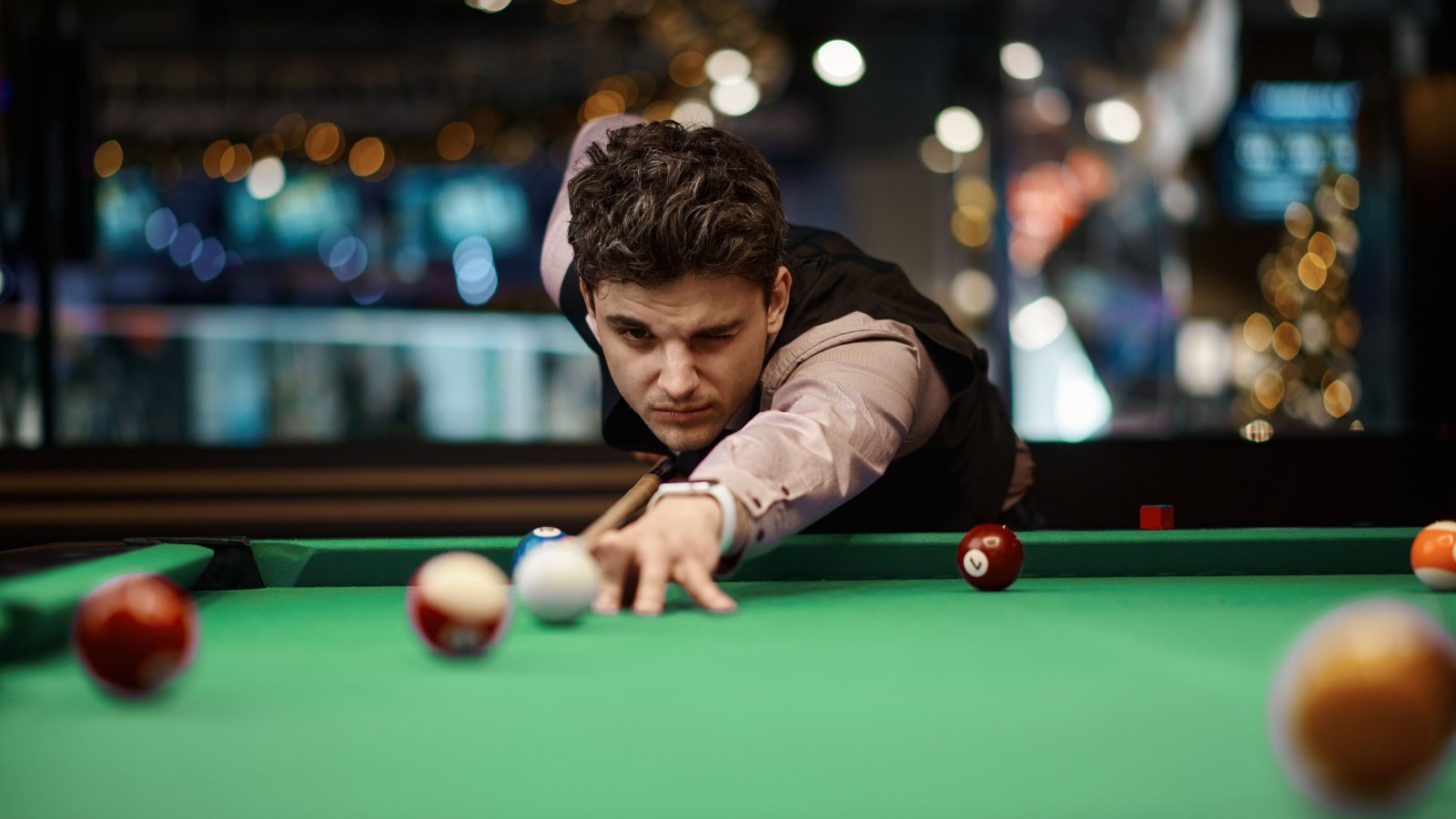 male playing billiards bar Nomad Soul Shutterstock