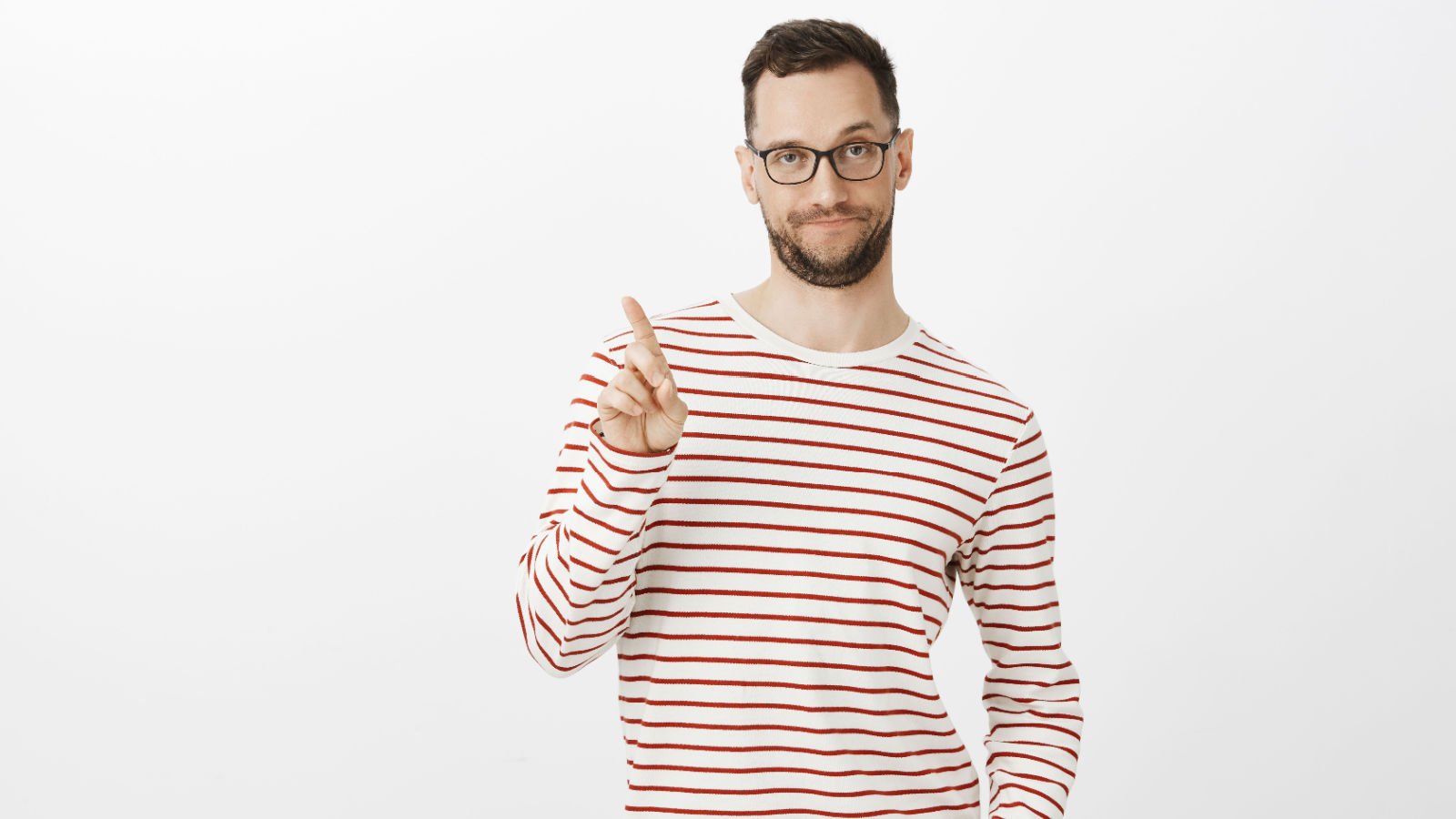 male with bristle and glasses shaking finger wait cookie studio shutterstock