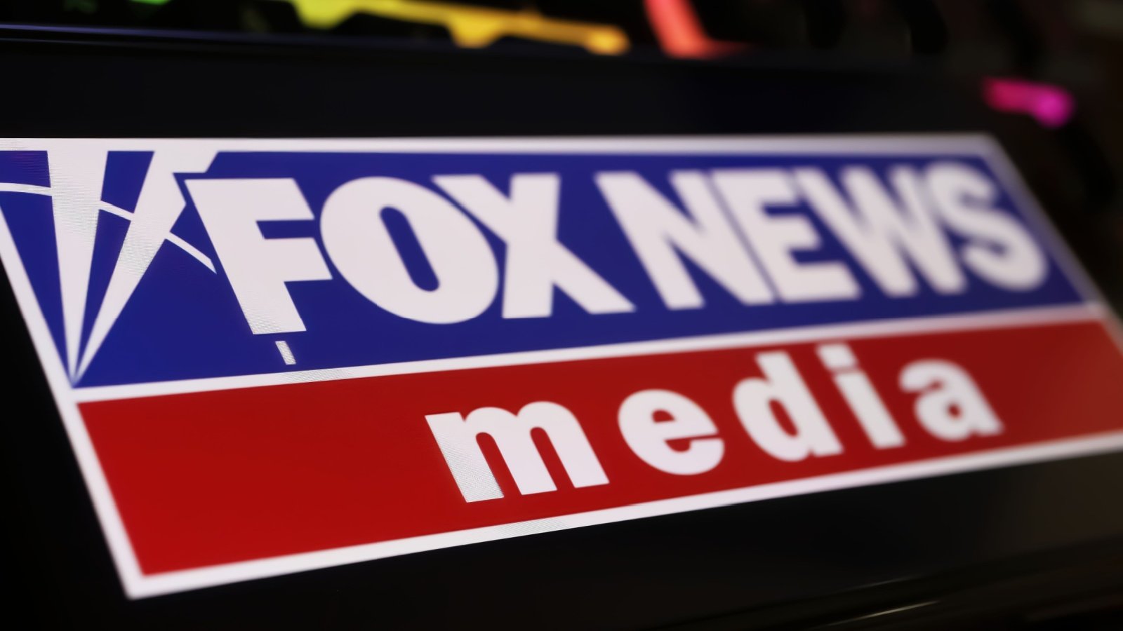 mobile phone with Fox news media channel Ralf Liebhold Shutterstock