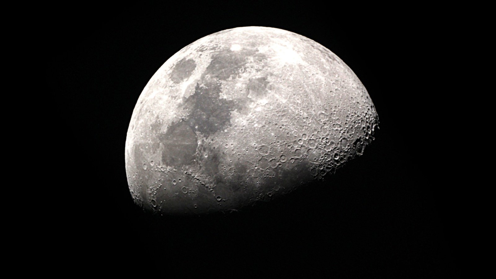 moon Earth space mission crater telescope taffpixture Shutterstock