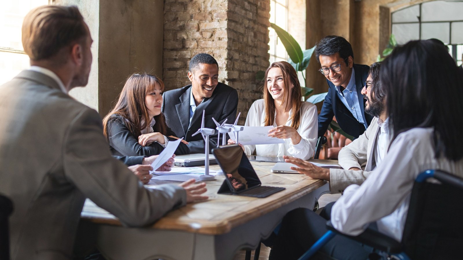 multiethnic businesspeople working on strategy advocacy meeting Lomb Shutterstock