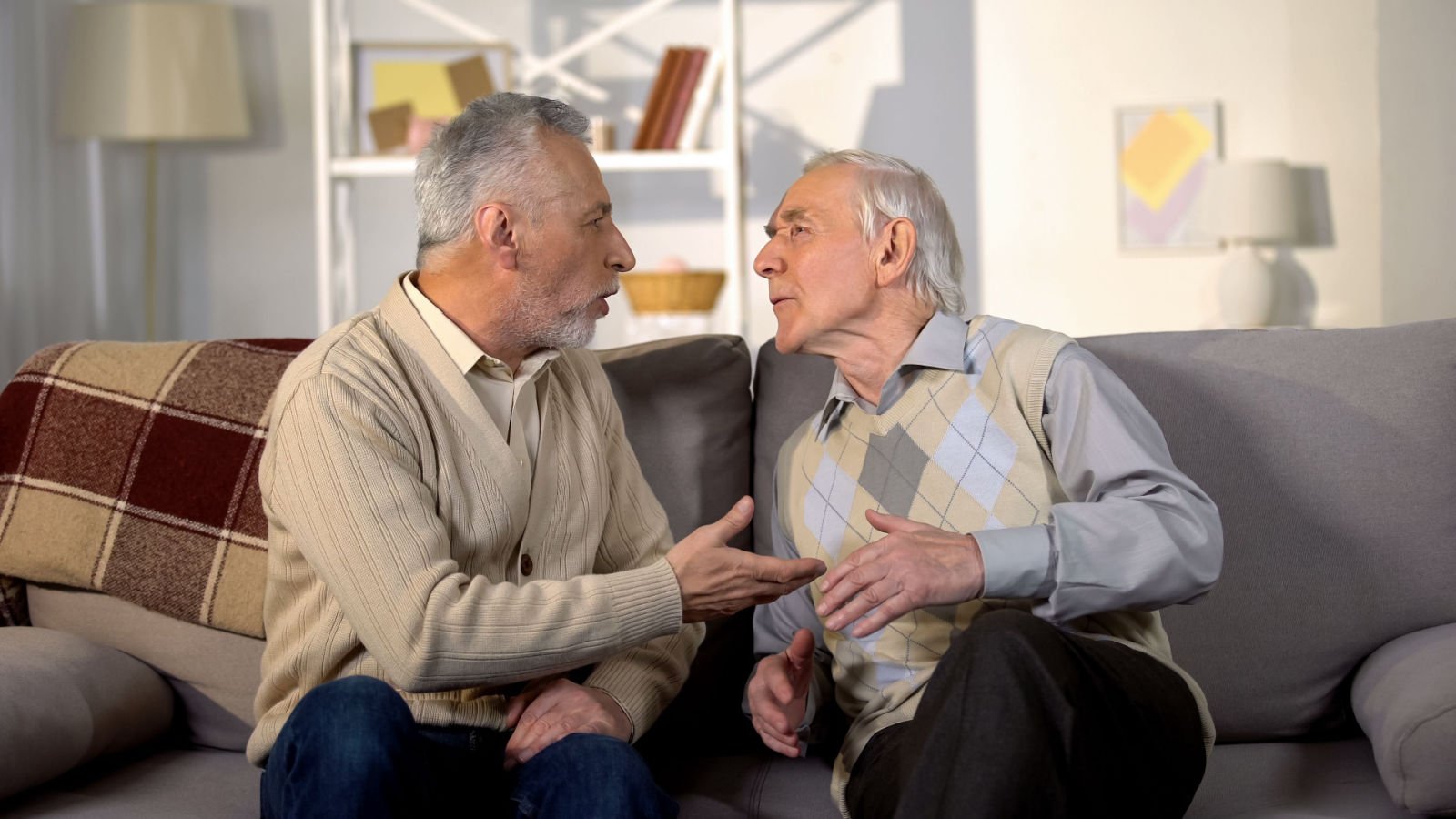 old men fathers arguing yelling motortion films shutterstock