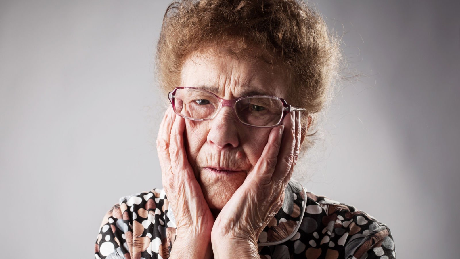 old woman senior Sad adult Grandmother worried gladskikh tatiana shutterstock