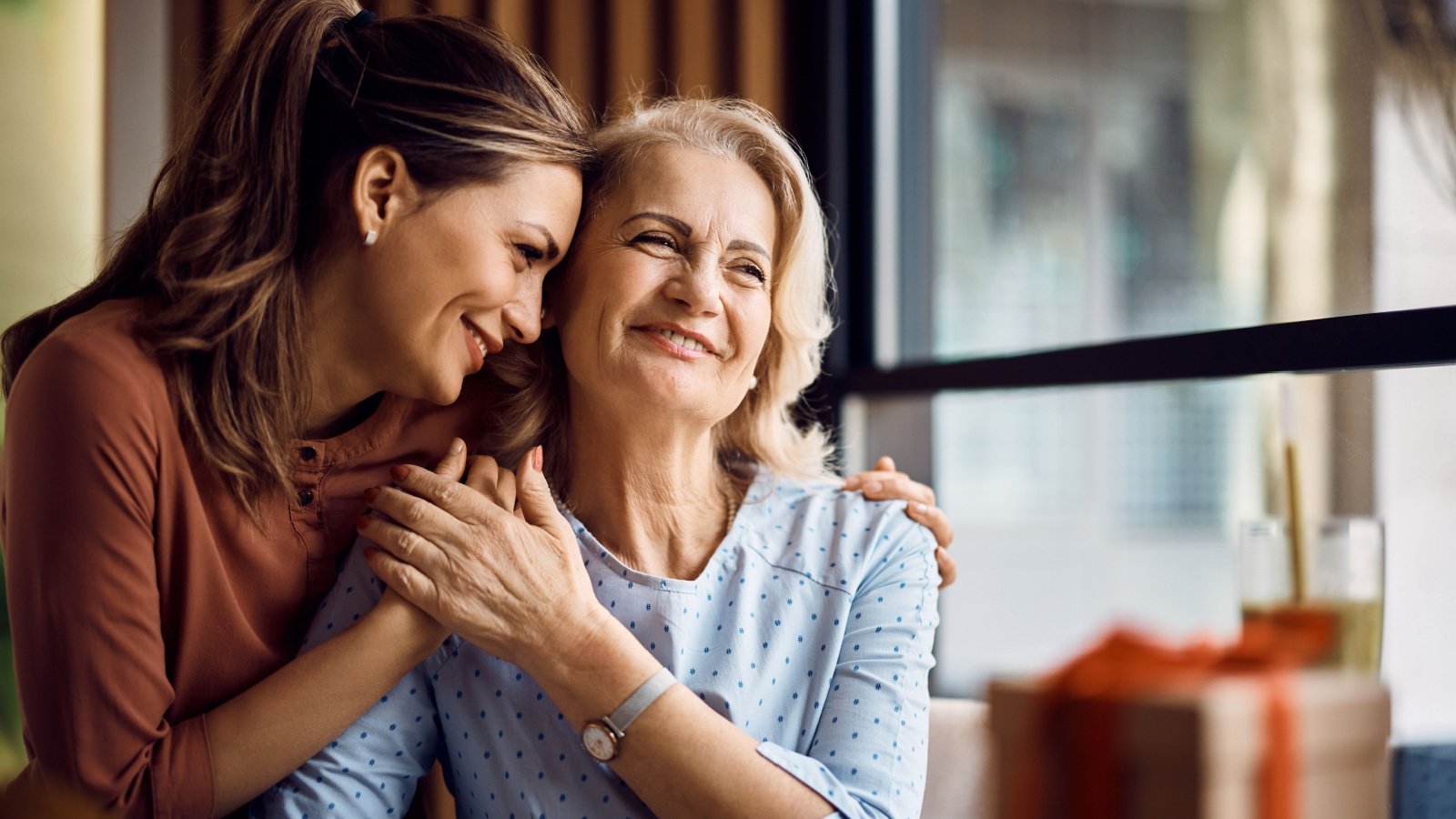 older senior mother with adult daughter Drazen Zigic shutterstock