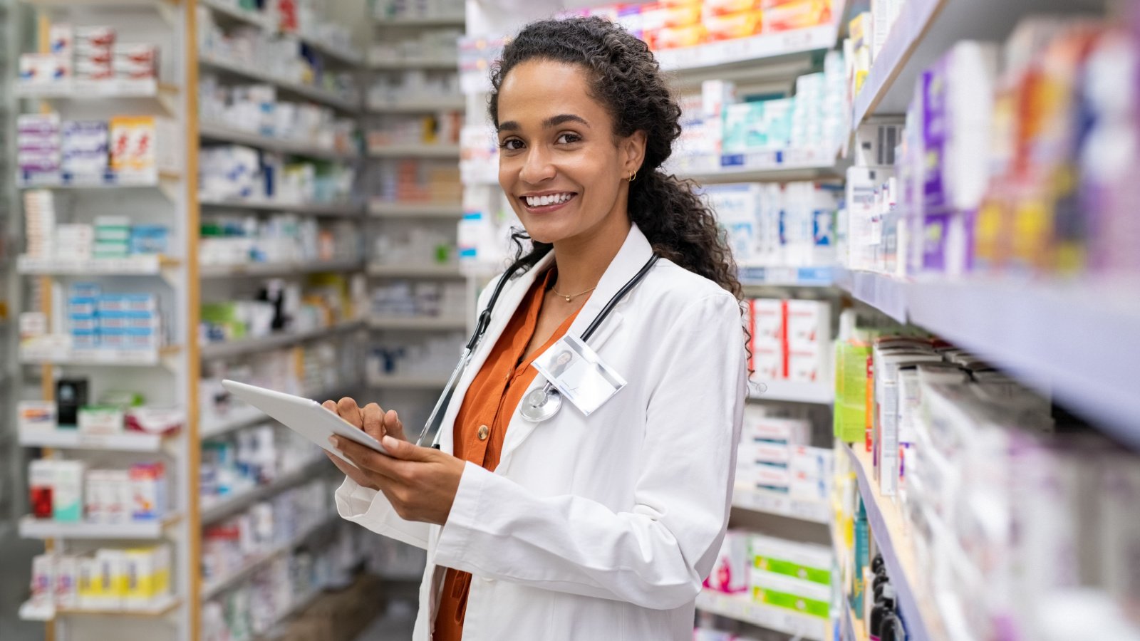 pharmacist doing inventory in a provided and modern pharmacy jobs ground picture shutterstock