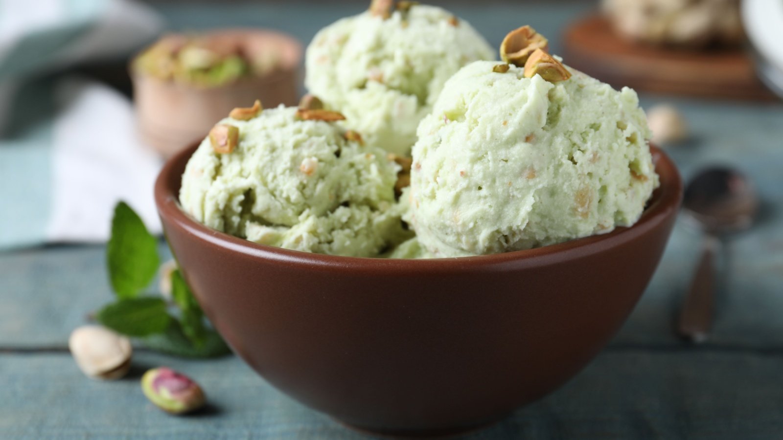 pistachio ice cream in bowl New Africa Shutterstock