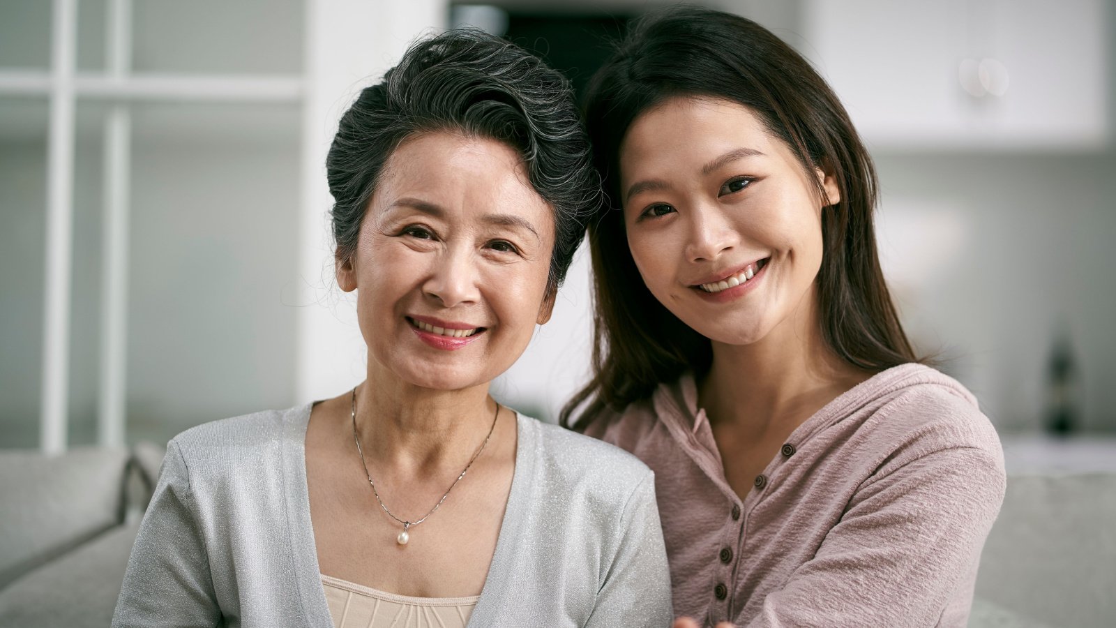 poc asian woman daughter mother care