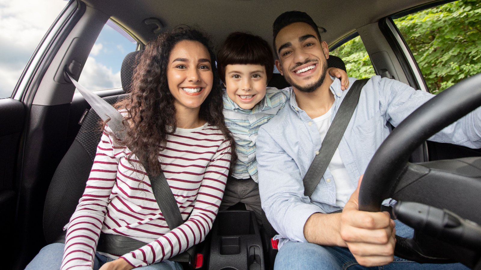 poc family driving car interior Prostock studio shutterstock